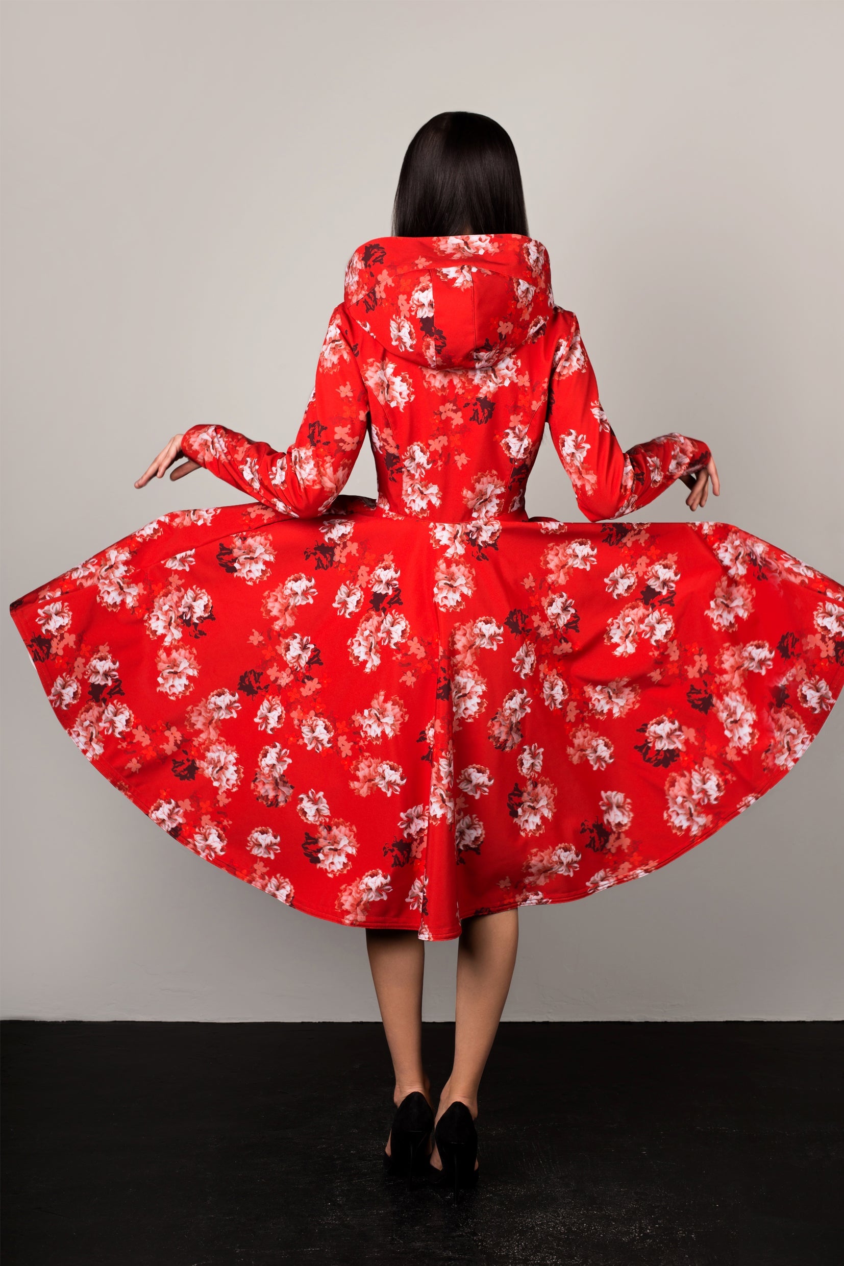red coat with full circle skirts