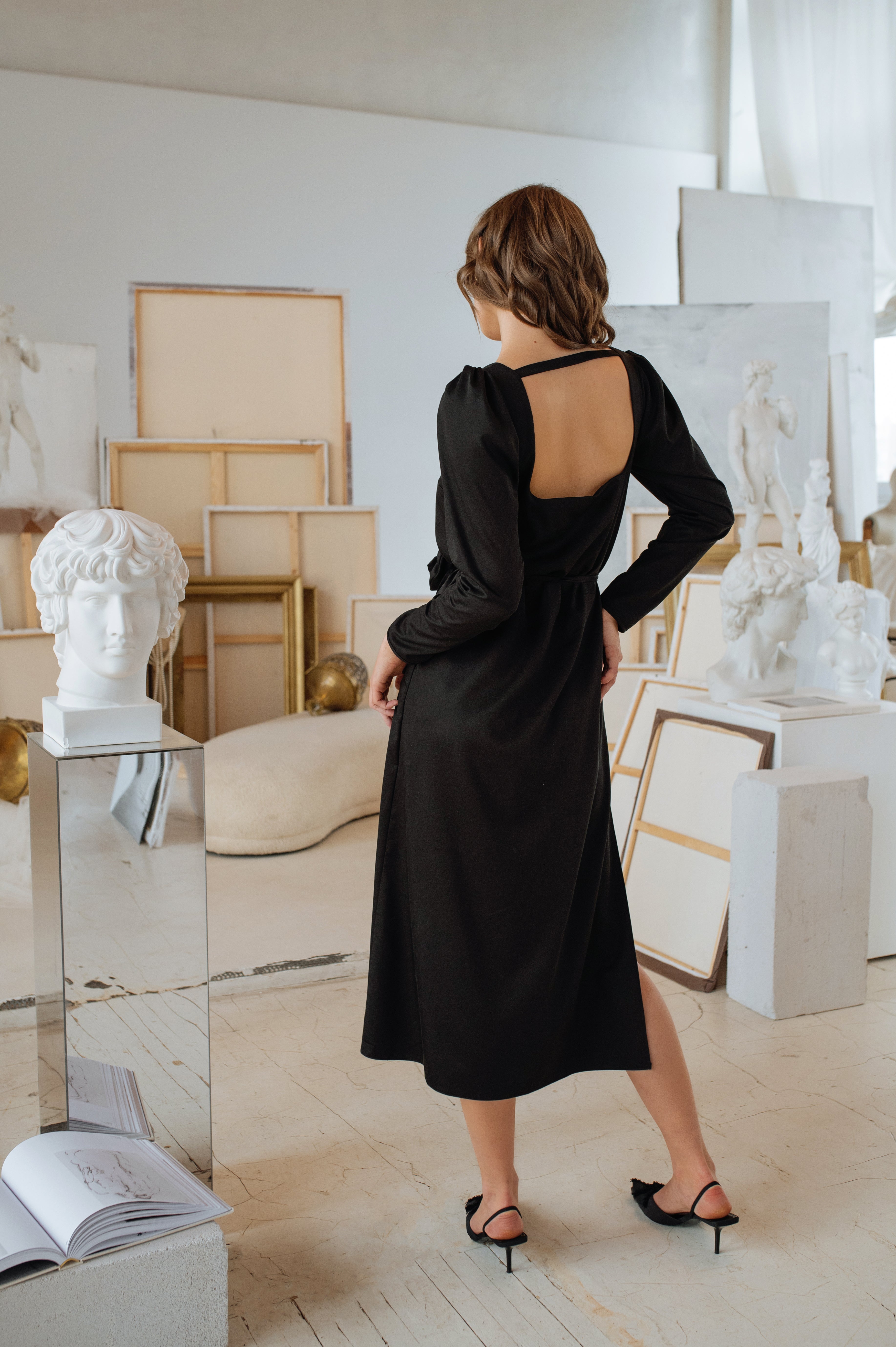 Model showing the graceful movement of the dress and mid-calf hemline.