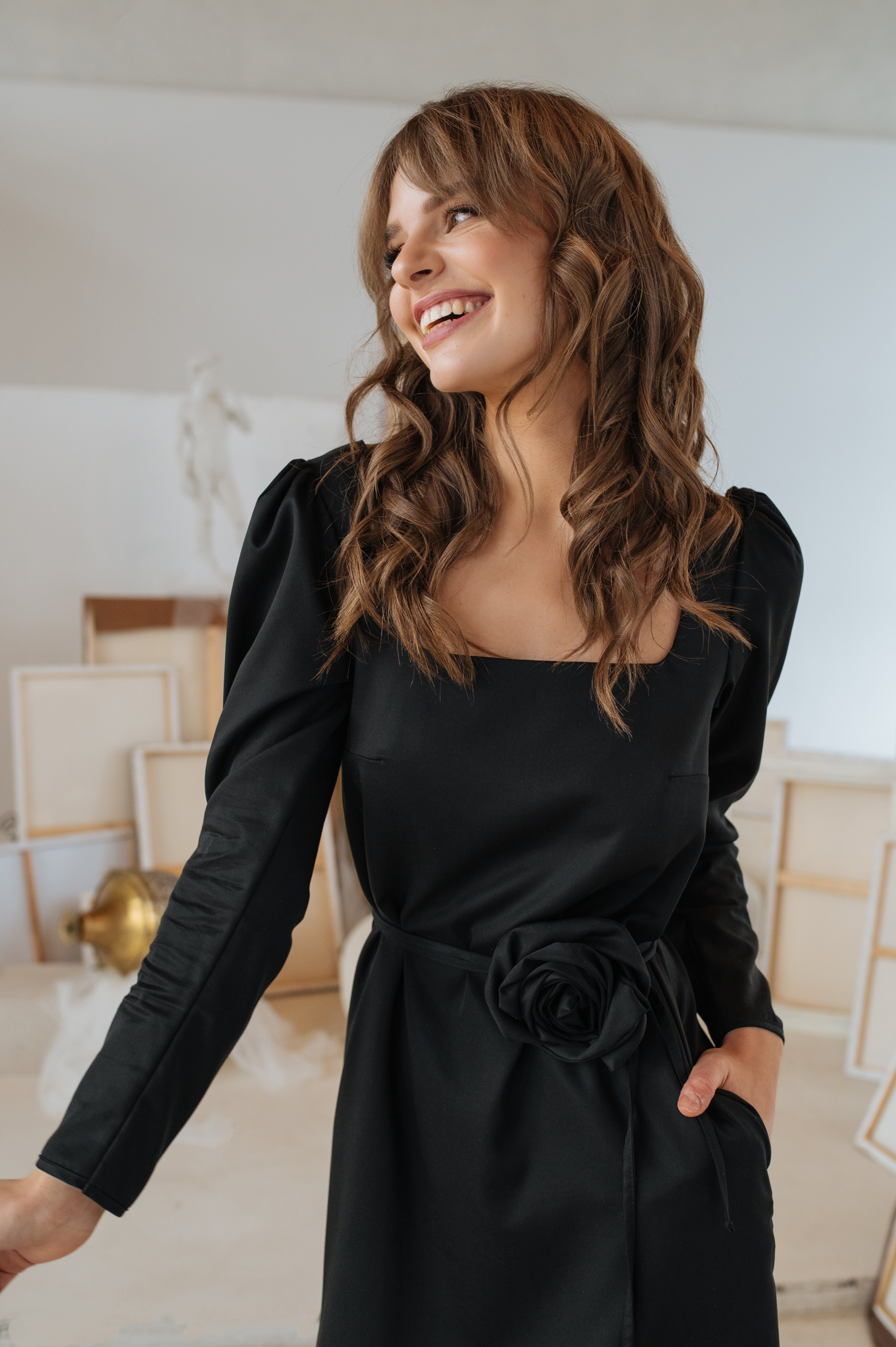 Detailed shot of the Lyocell-blend fabric and rose belt texture, showing the quality and soft sheen.