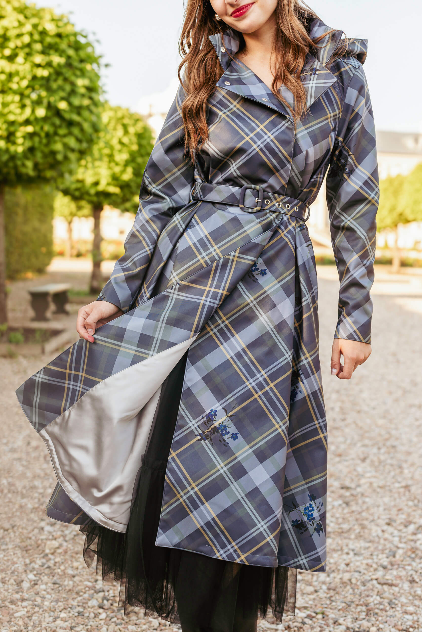 Close-up of belted waist and structured design of Duchess in Blue coat.