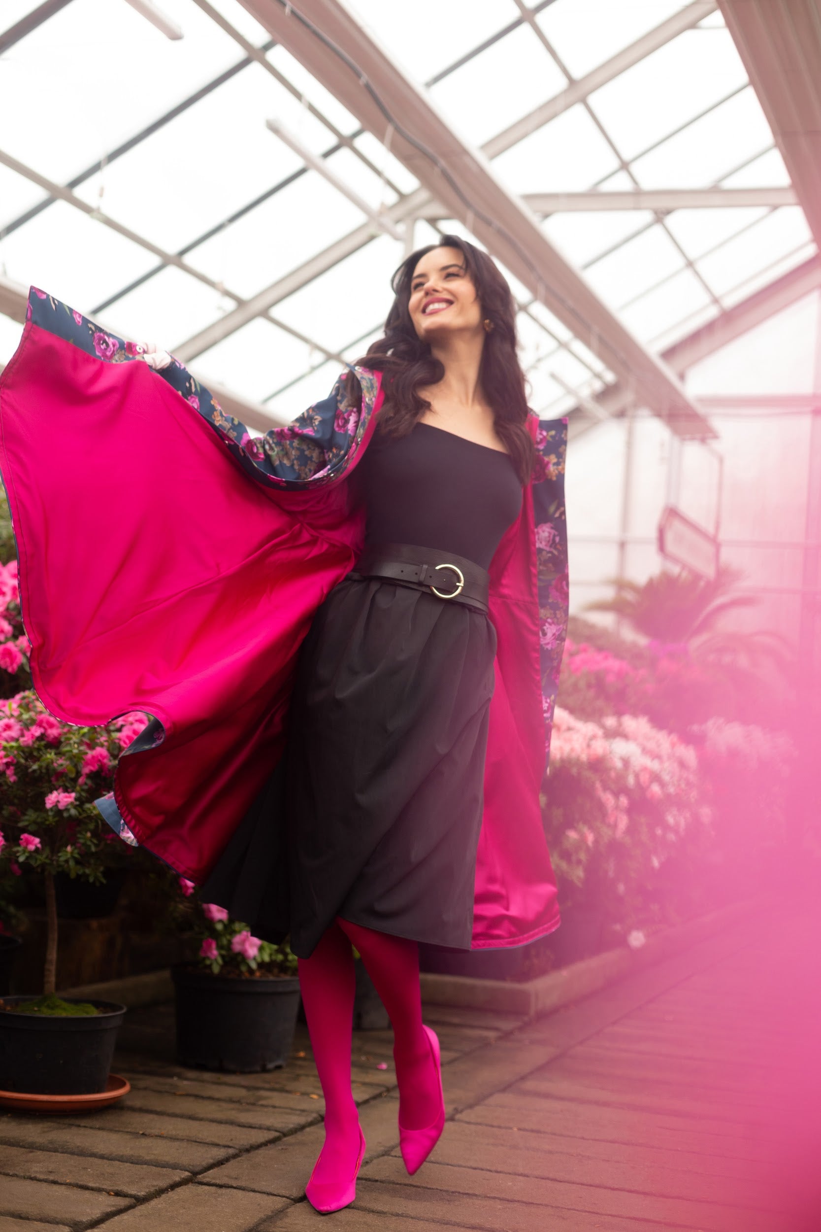 bright pink lining of the fitted trench coat