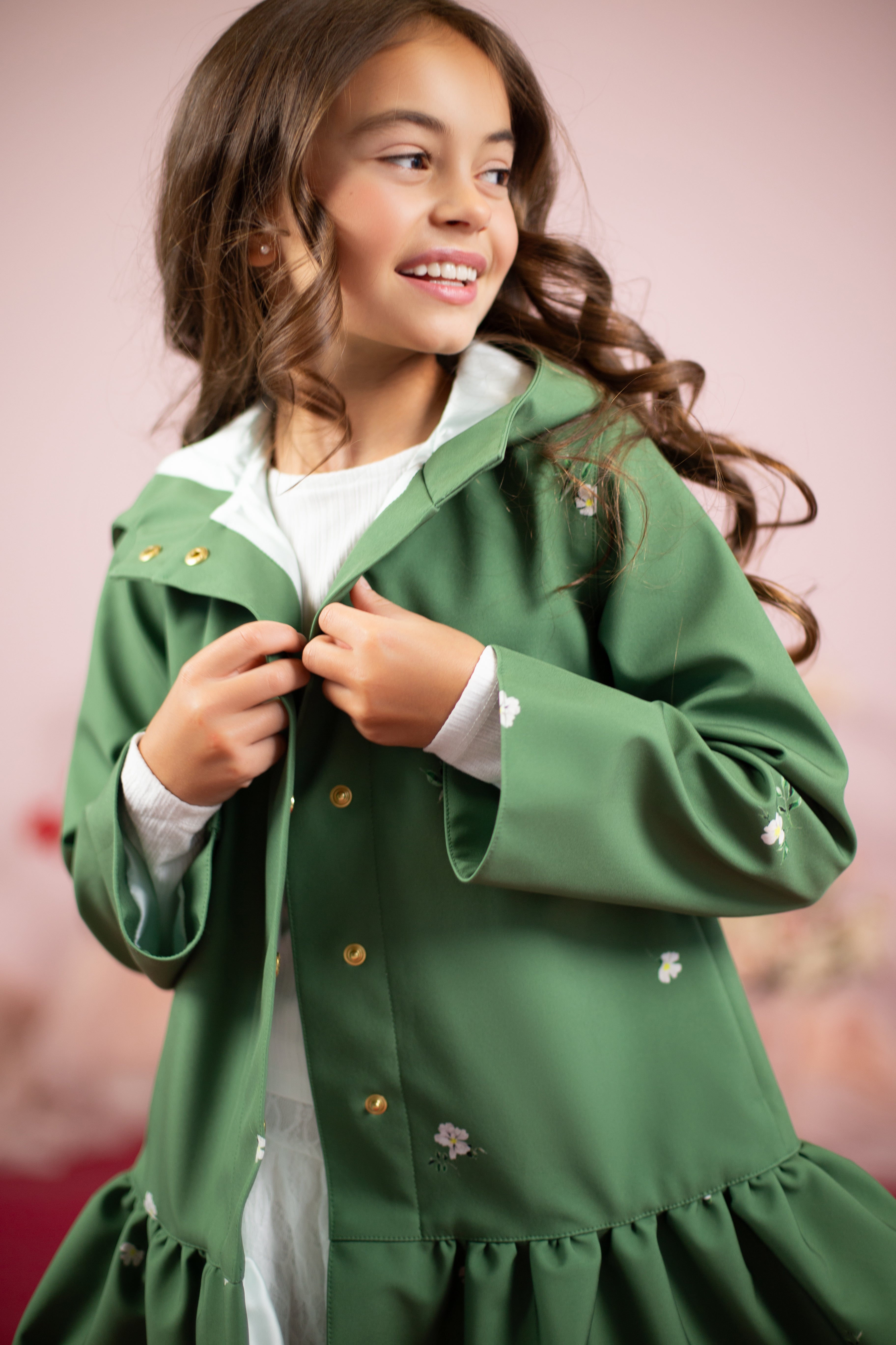 Green coat in trapeze cut for girls