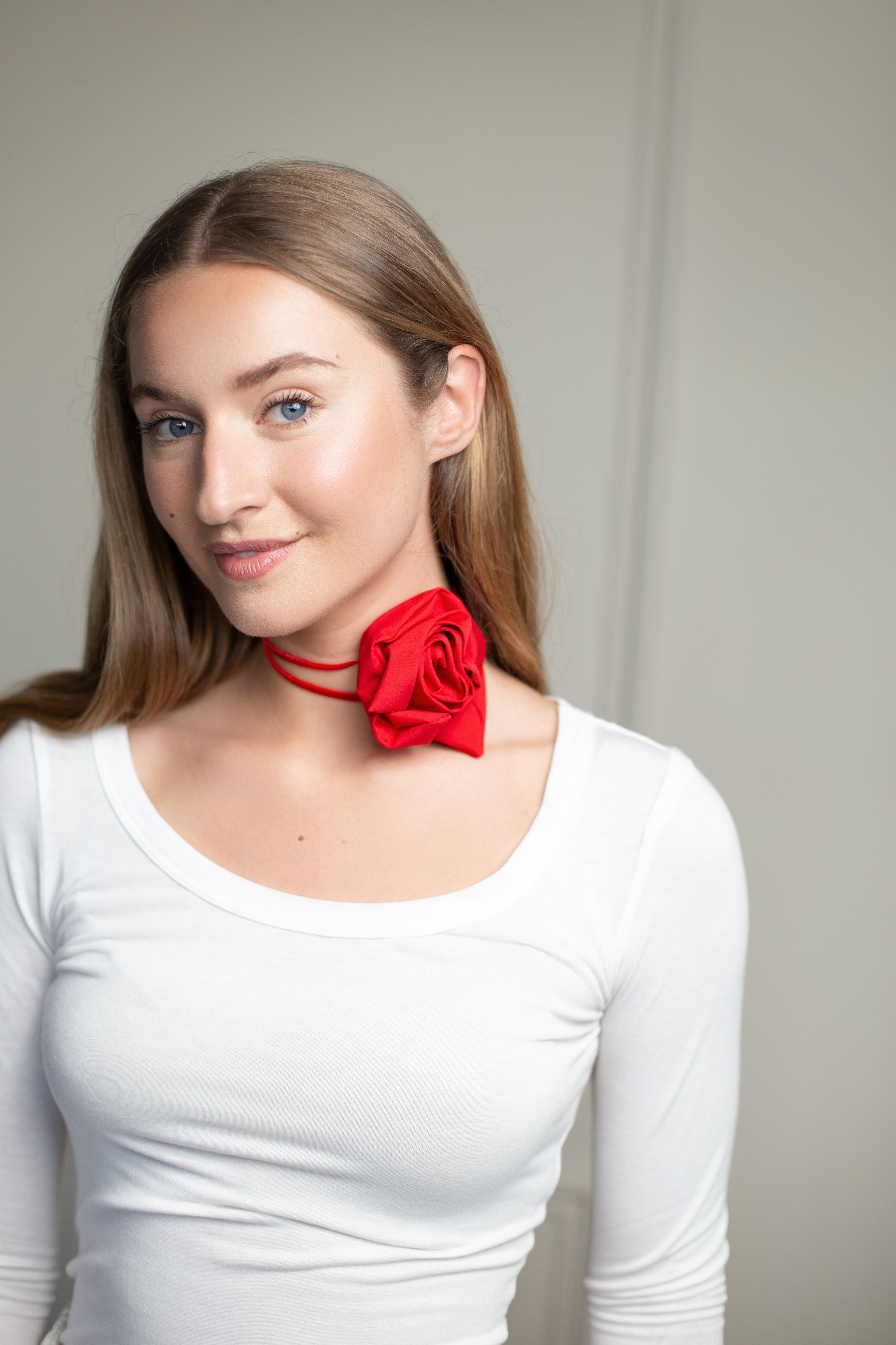 Vintage-inspired red rose choker with adjustable ribbon