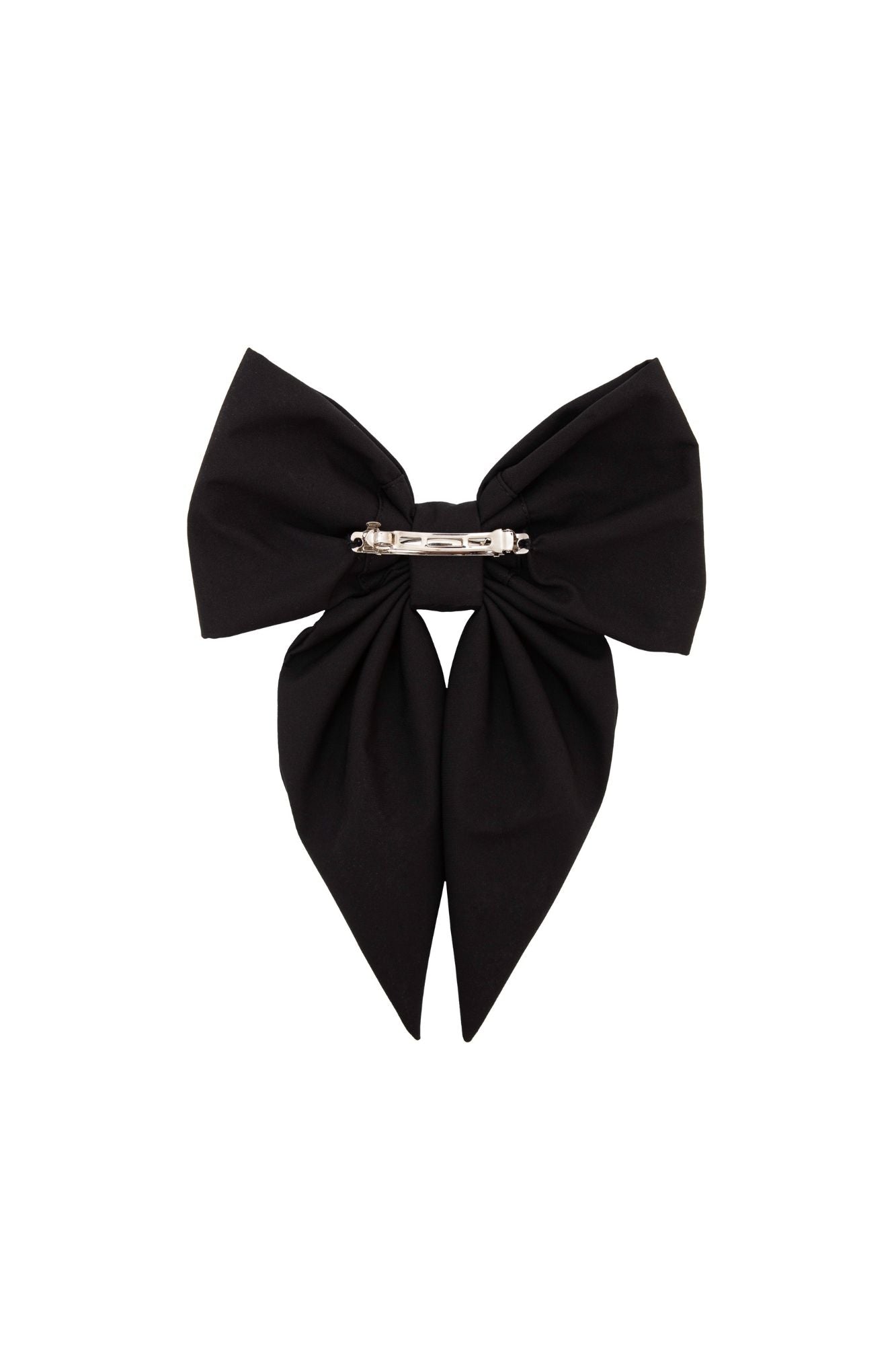 Black bow hair clip on a white background