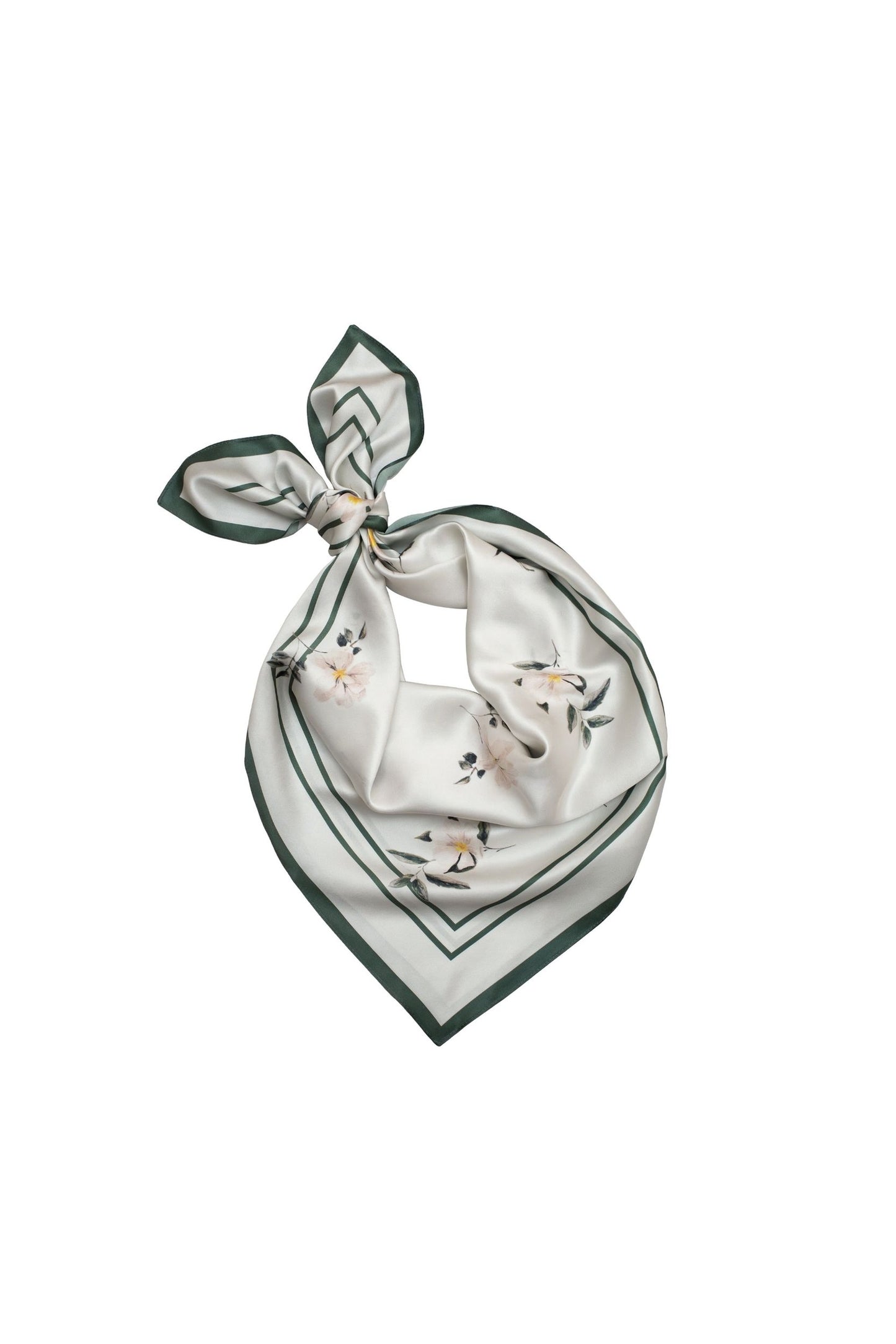 Neatly folded scarf with floral pattern on a white background