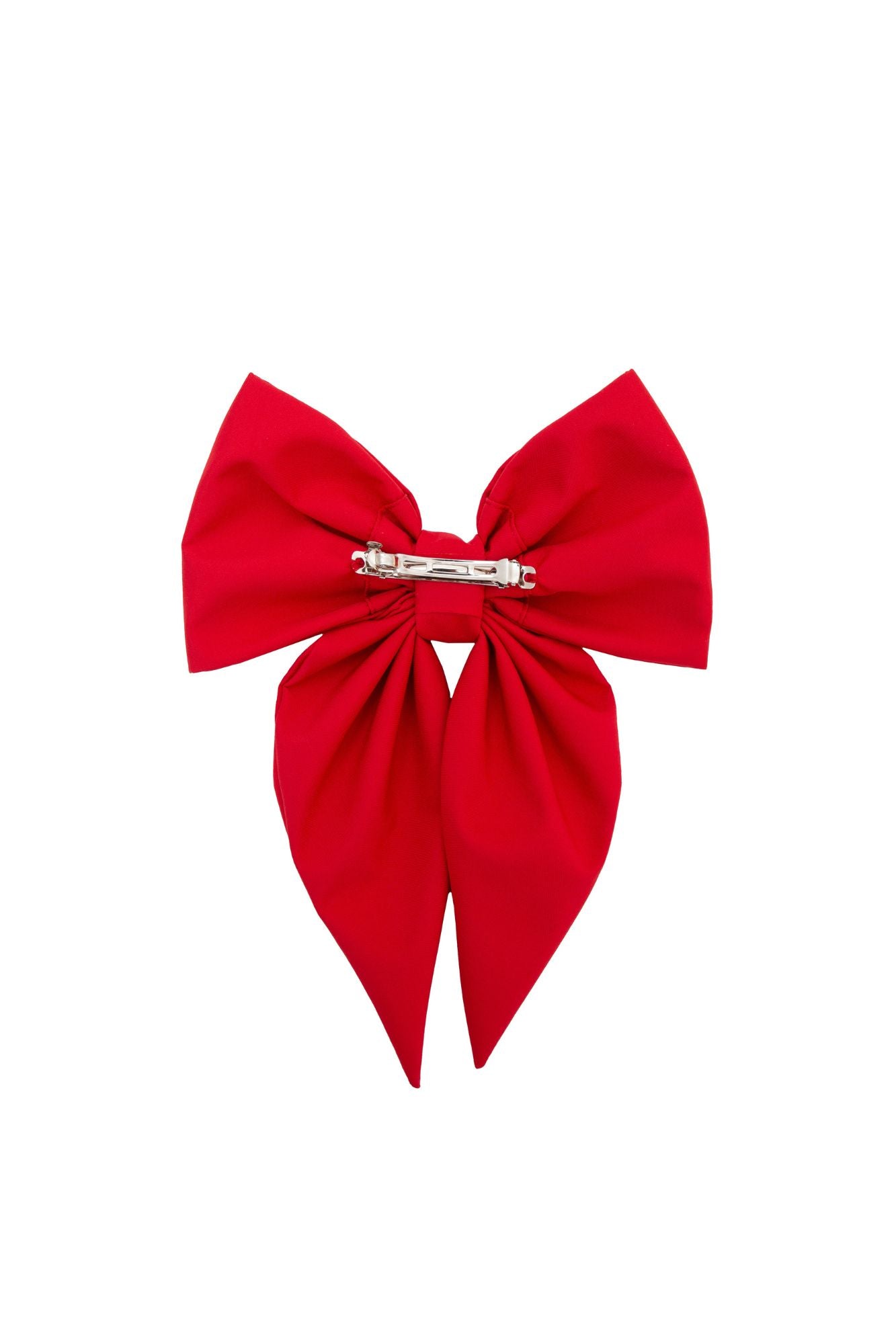 Red bow hair clip on a white background