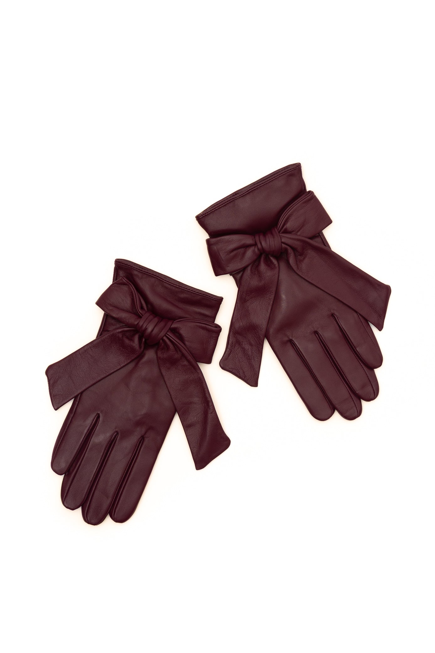 A pair of dark burgundy leather gloves with wide wristbands and large bow details, displayed on a clean white background.