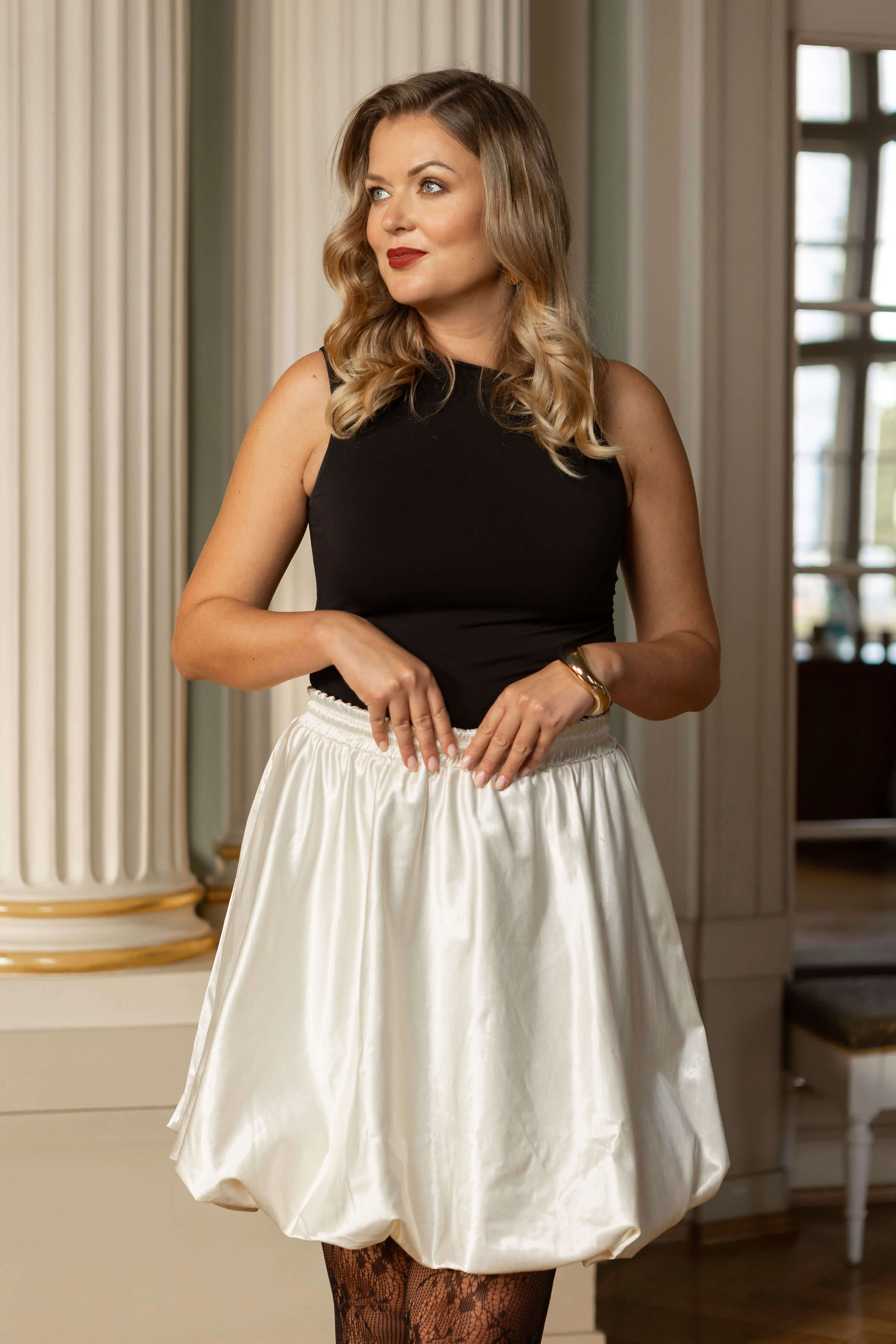 Mini-length off-white balloon skirt for women with hidden pockets, lined with Italian satin, ideal for layering under dresses for extra volume.