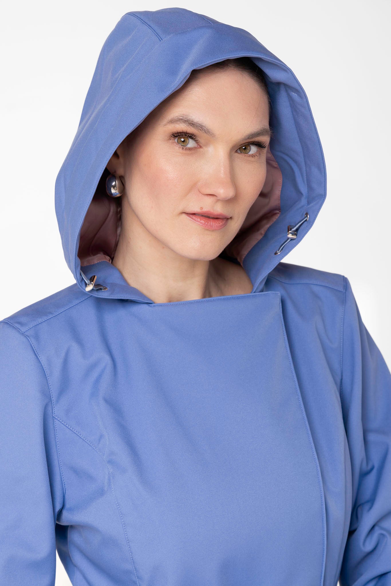 Close-up of hood detail on Blue Breeze soft blue women's trench coat
