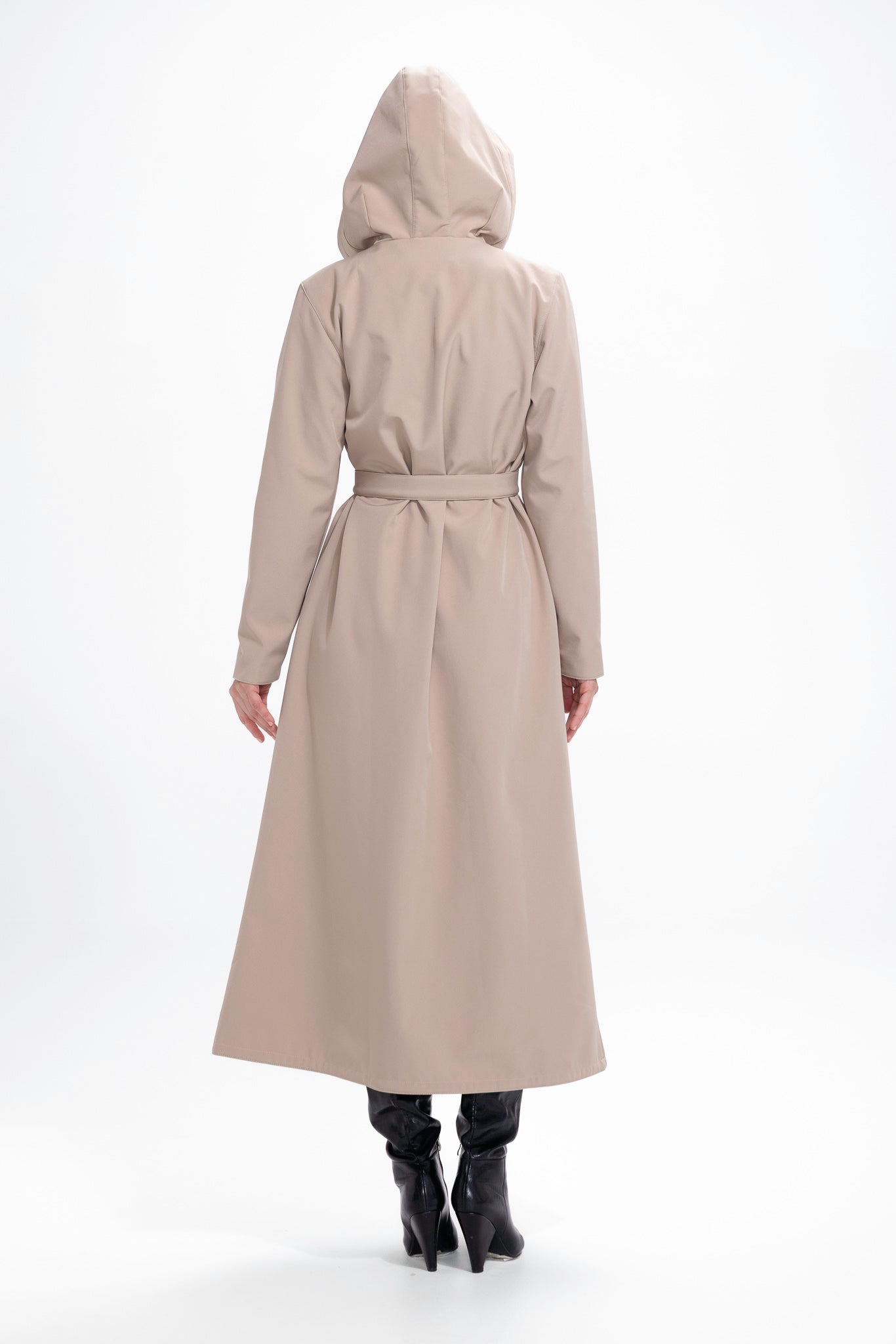 Back view of beige women's waterproof coat with flared trapeze cut and tailored fit