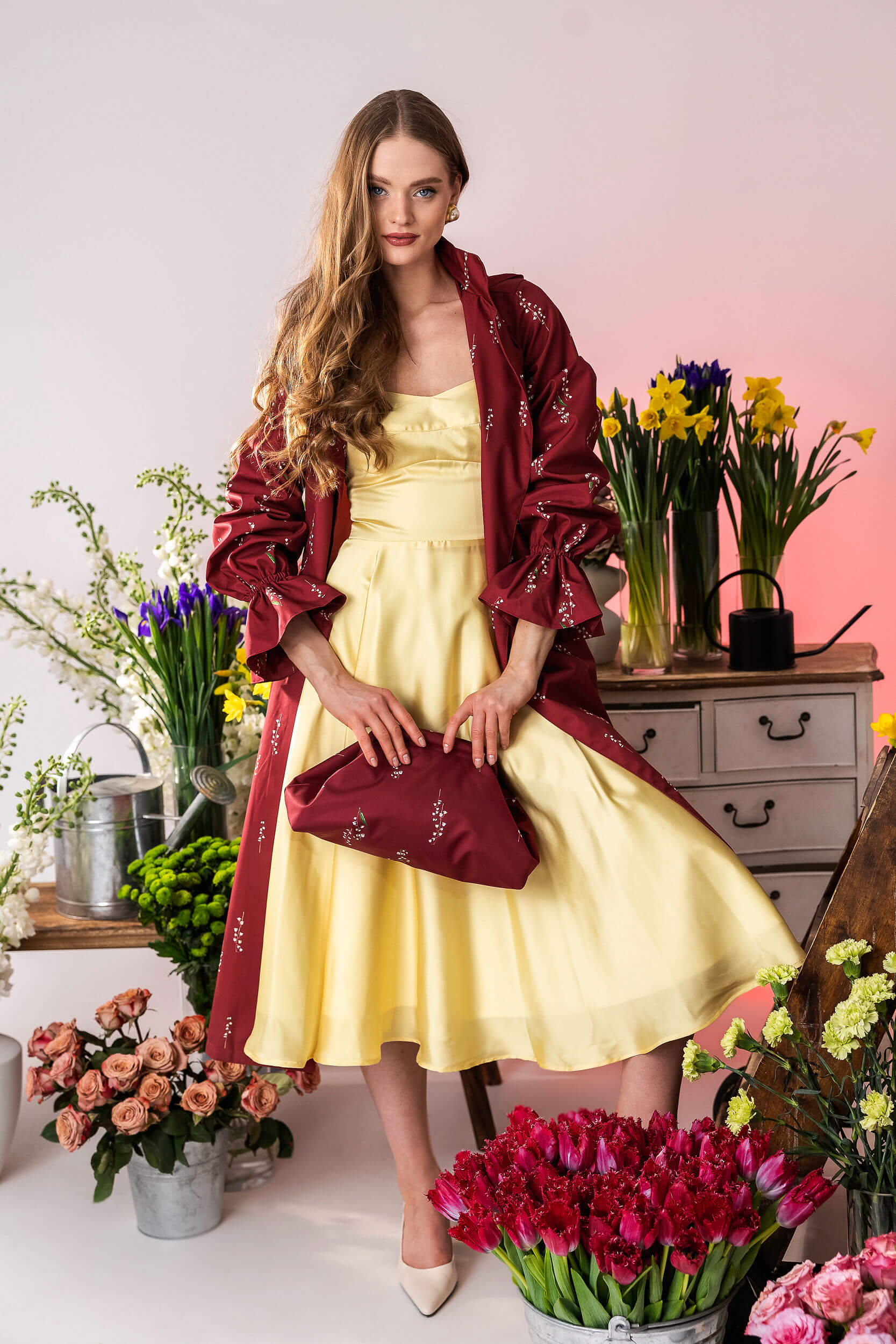 Long burgundy coat with pink satin lining