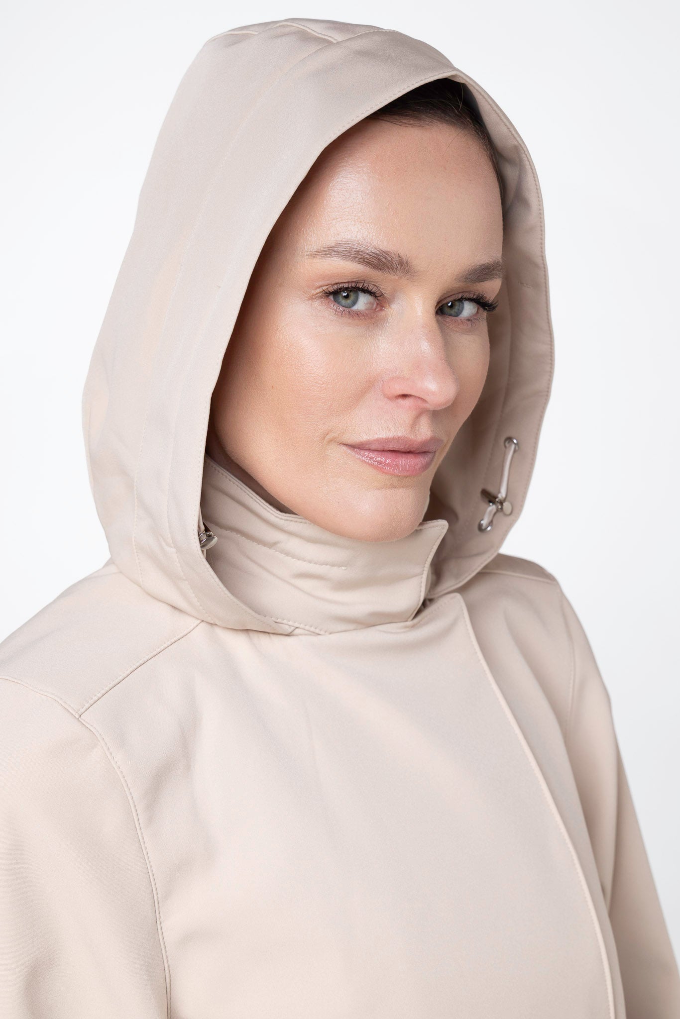 Close-up of hood detail on Desirable Bow beige women's trench coat