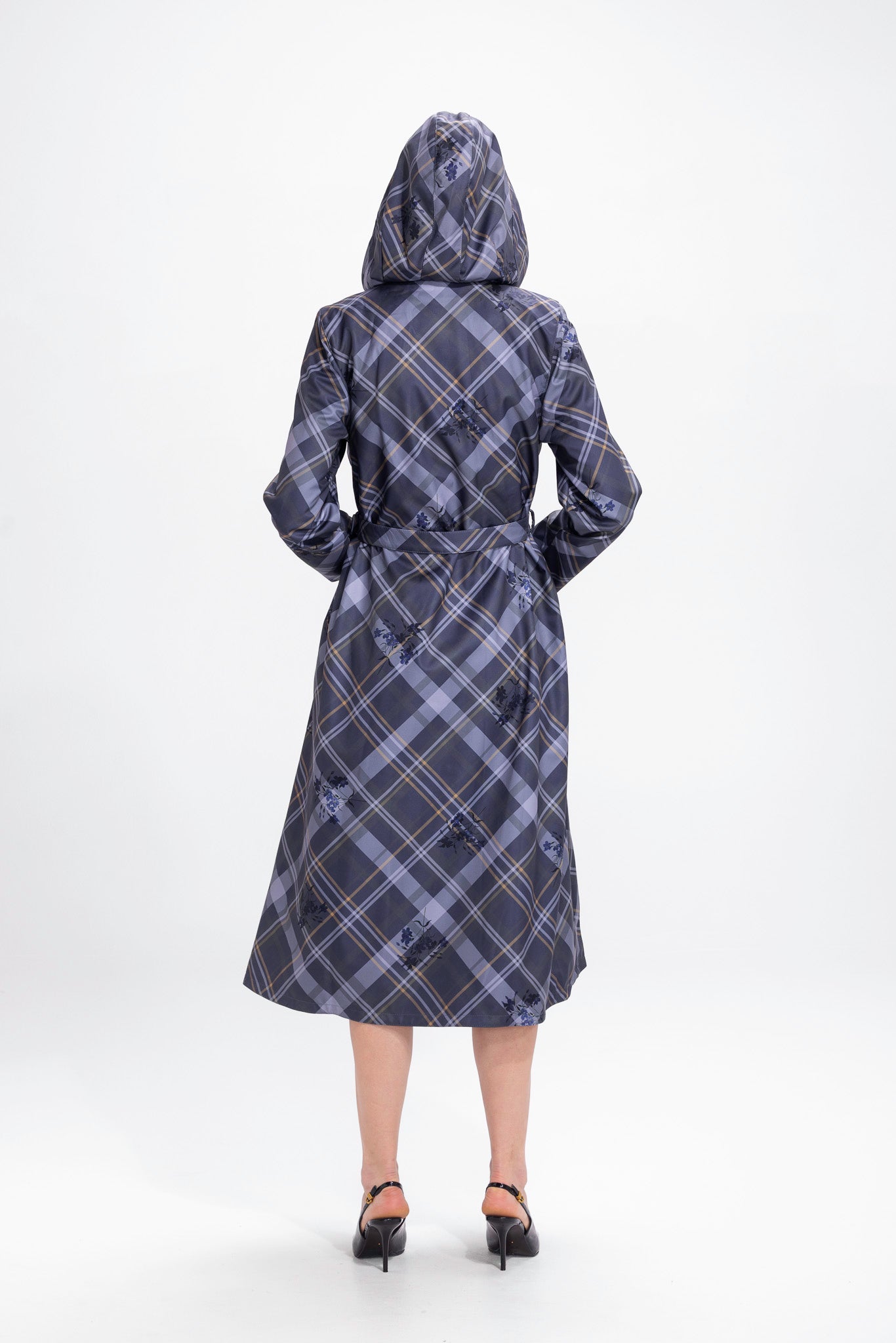 Back view of grey-blue double-breasted women's trench coat with tailored silhouette and matching belt