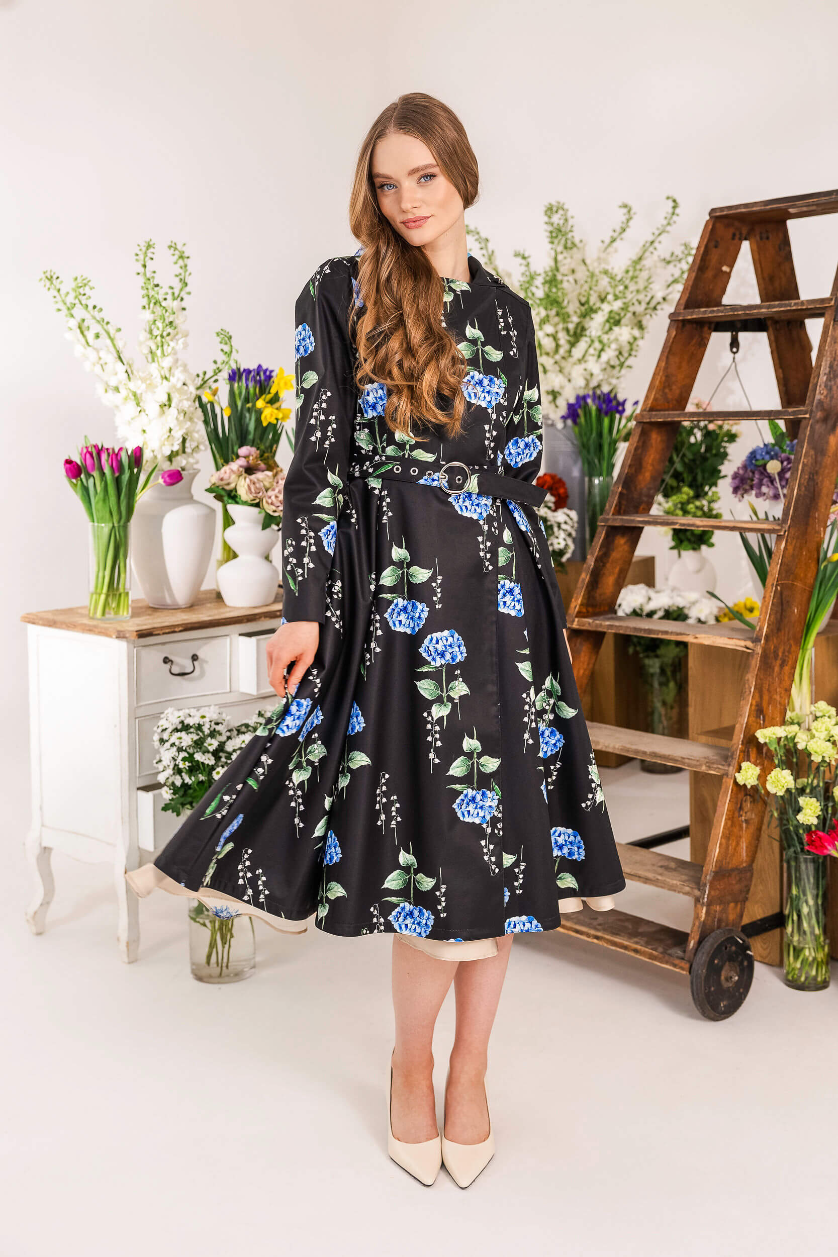 Black hooded coat with hidden pockets and soft blue lining