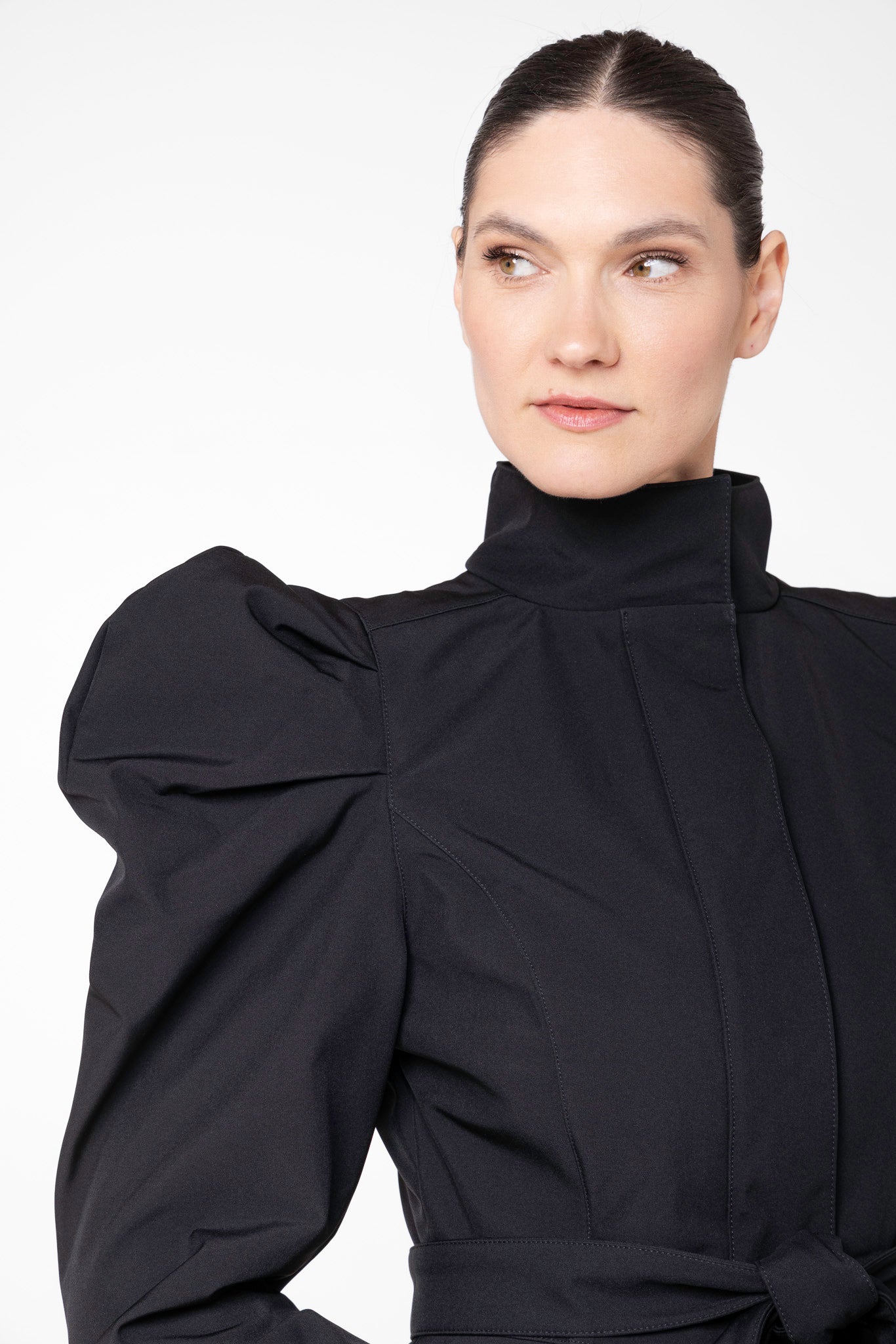 Statement balloon sleeve detail on black vintage-inspired women's coat