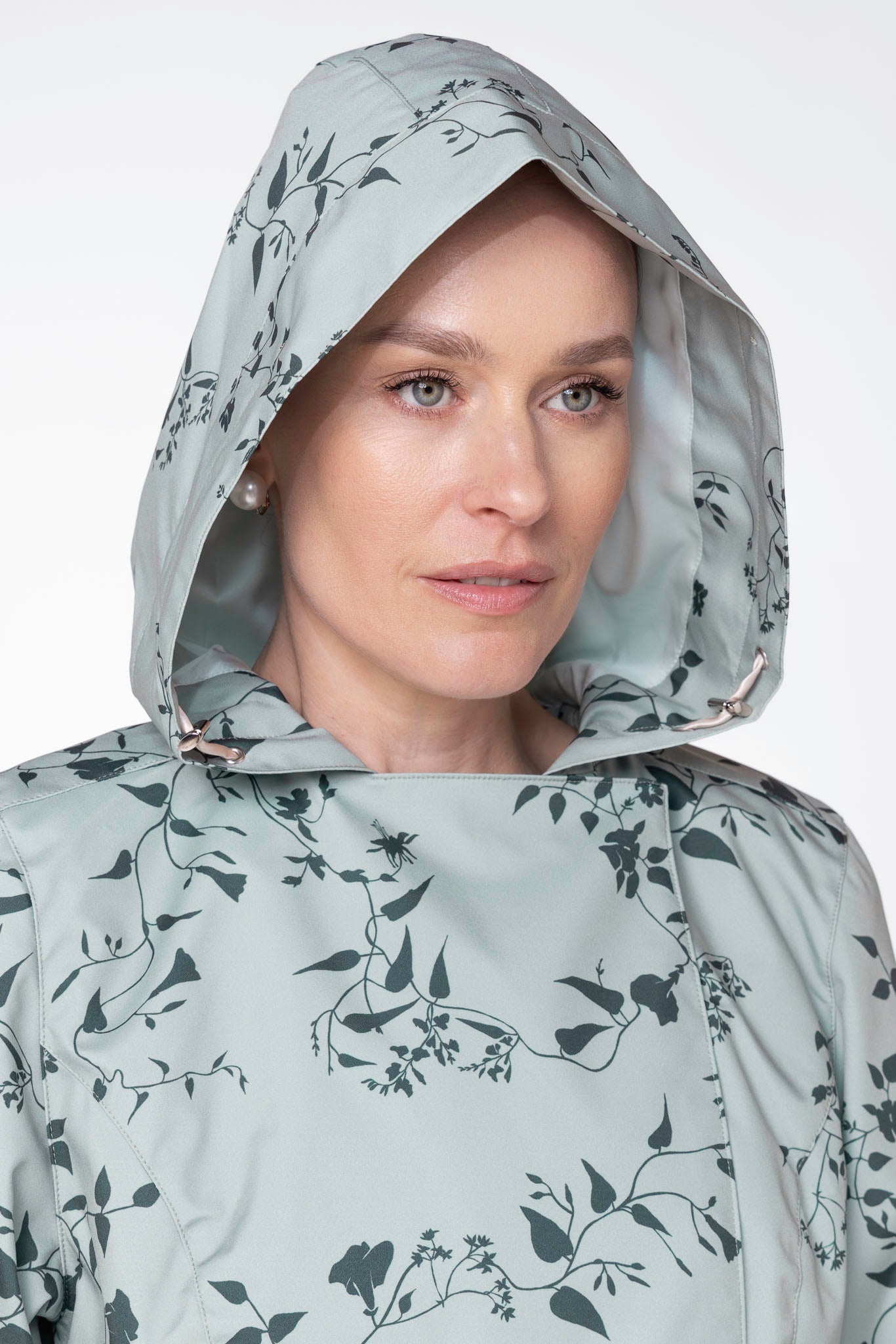 Close-up of hood detail on Minty Meadow lightweight water-resistant women's coat
