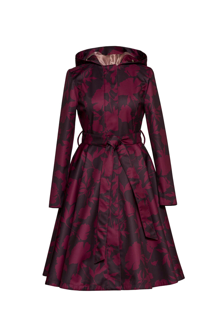 Women's burgundy floral fit and flare coat with a full circle skirt, matching tie belt, and removable hood on a white background.
