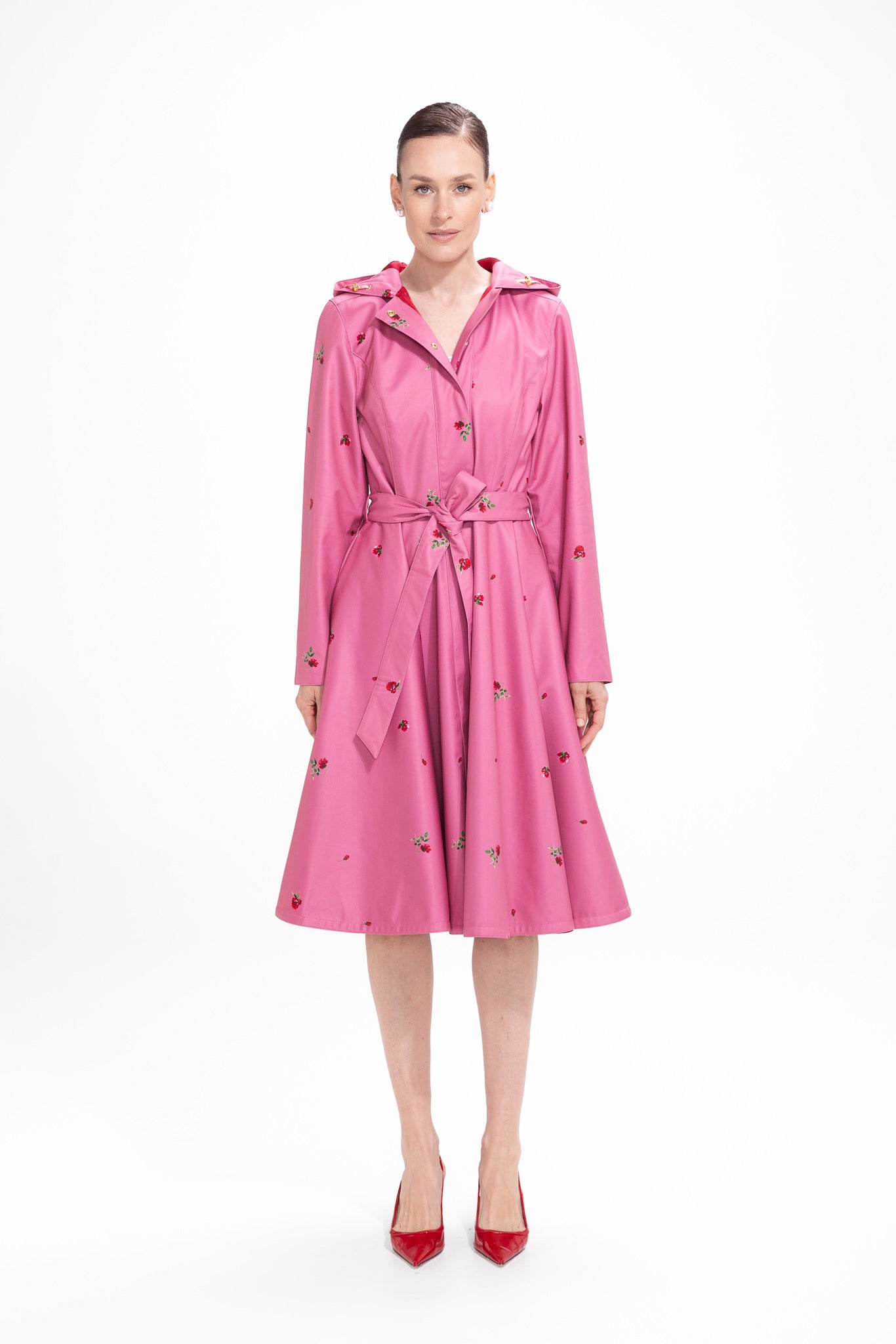 Raspberry Sorbet pink floral water-resistant women's fit and flare coat with full circle skirt, front view