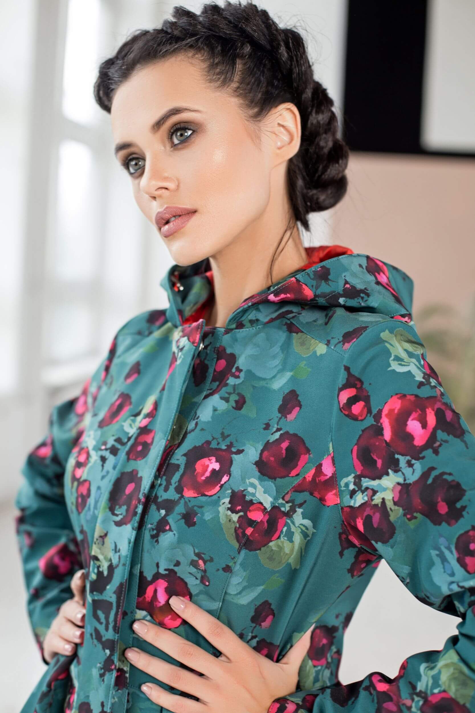 Close-up of hood detail on Rosalie green floral women's designer coat