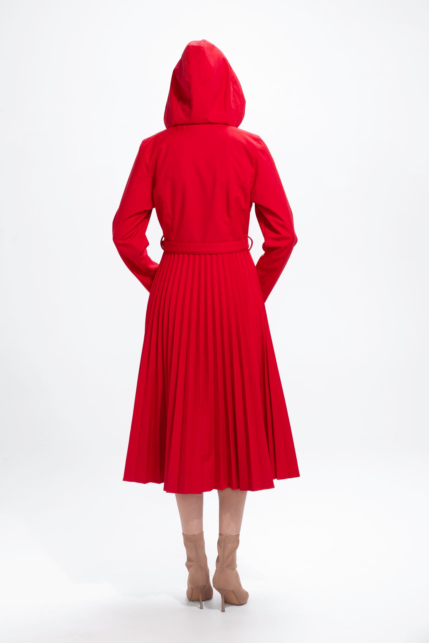 Back view of red women's water-resistant coat with A-line skirt and tailored silhouette