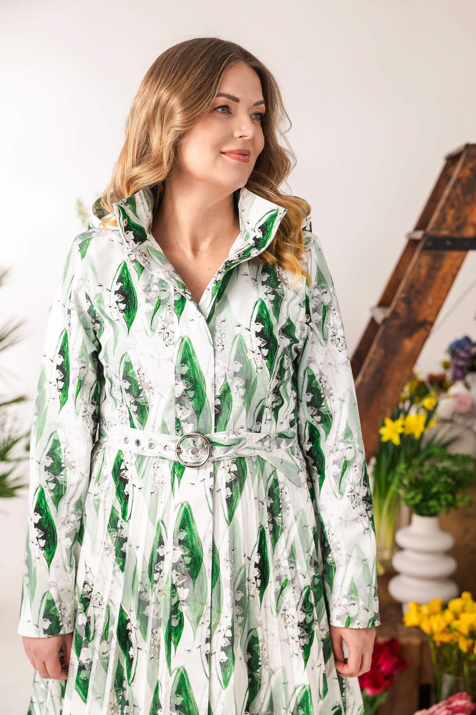 Fitted bodice coat with flared pleated A-line pleated skirt