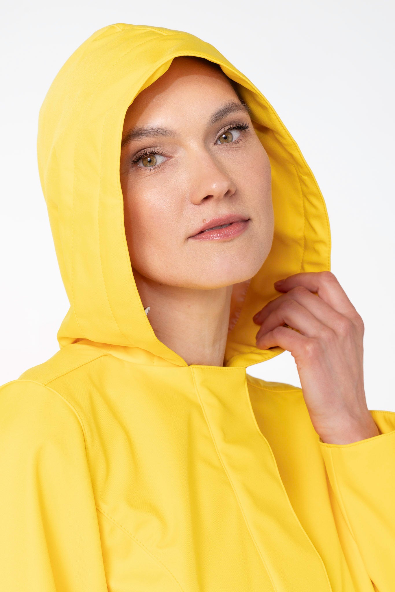 Close-up of hood detail on Yellow Sun bright yellow women's fashion coat