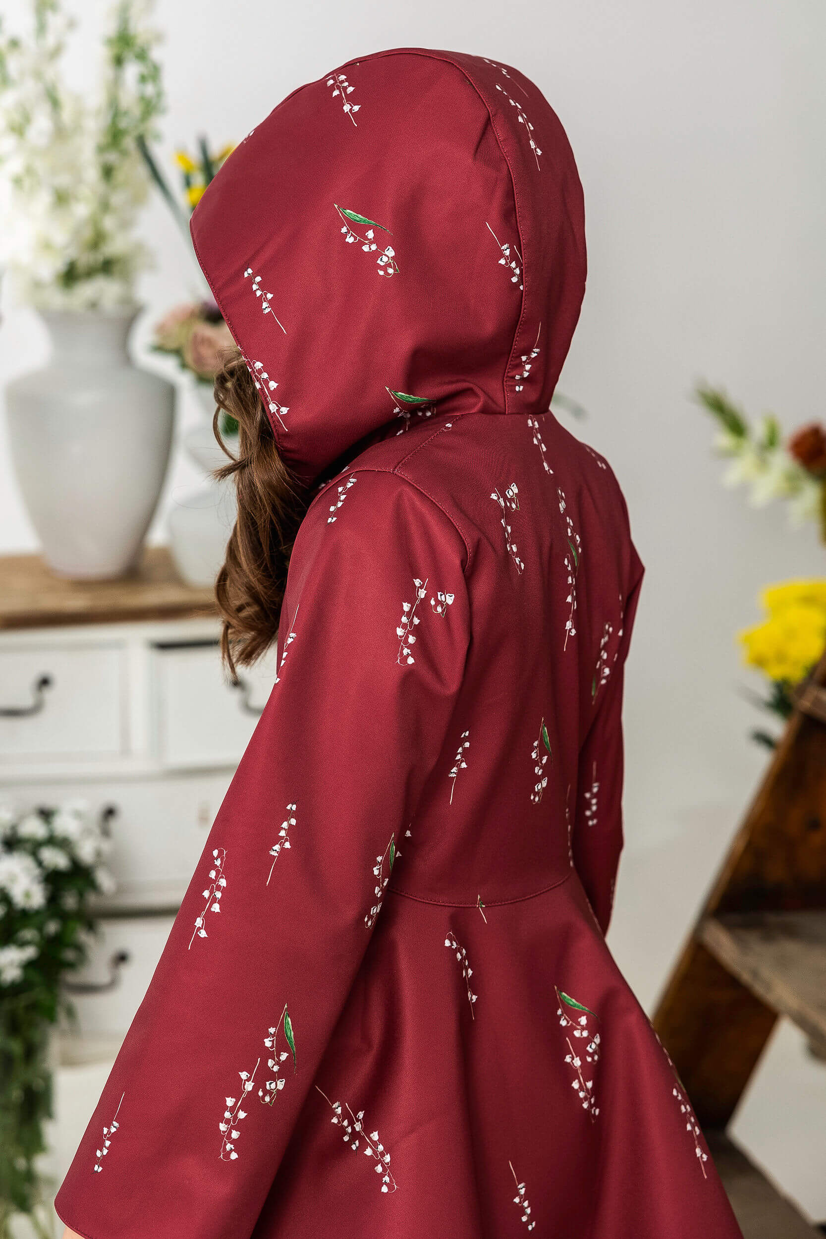 Deep red girl floral coat with a hood.