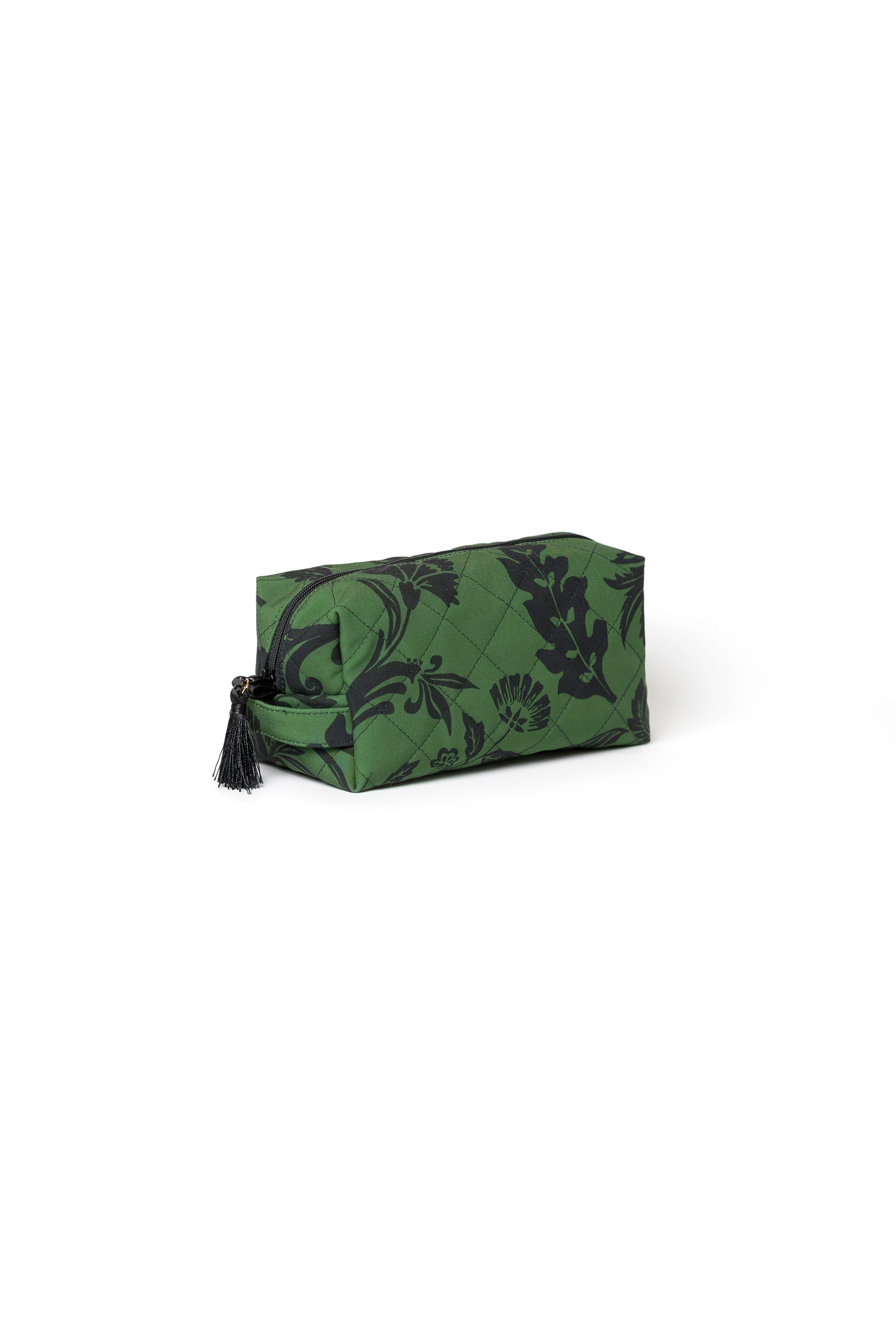Premium women's cosmetic bag in green with black floral print, decorative tassels, and soft violet lining.