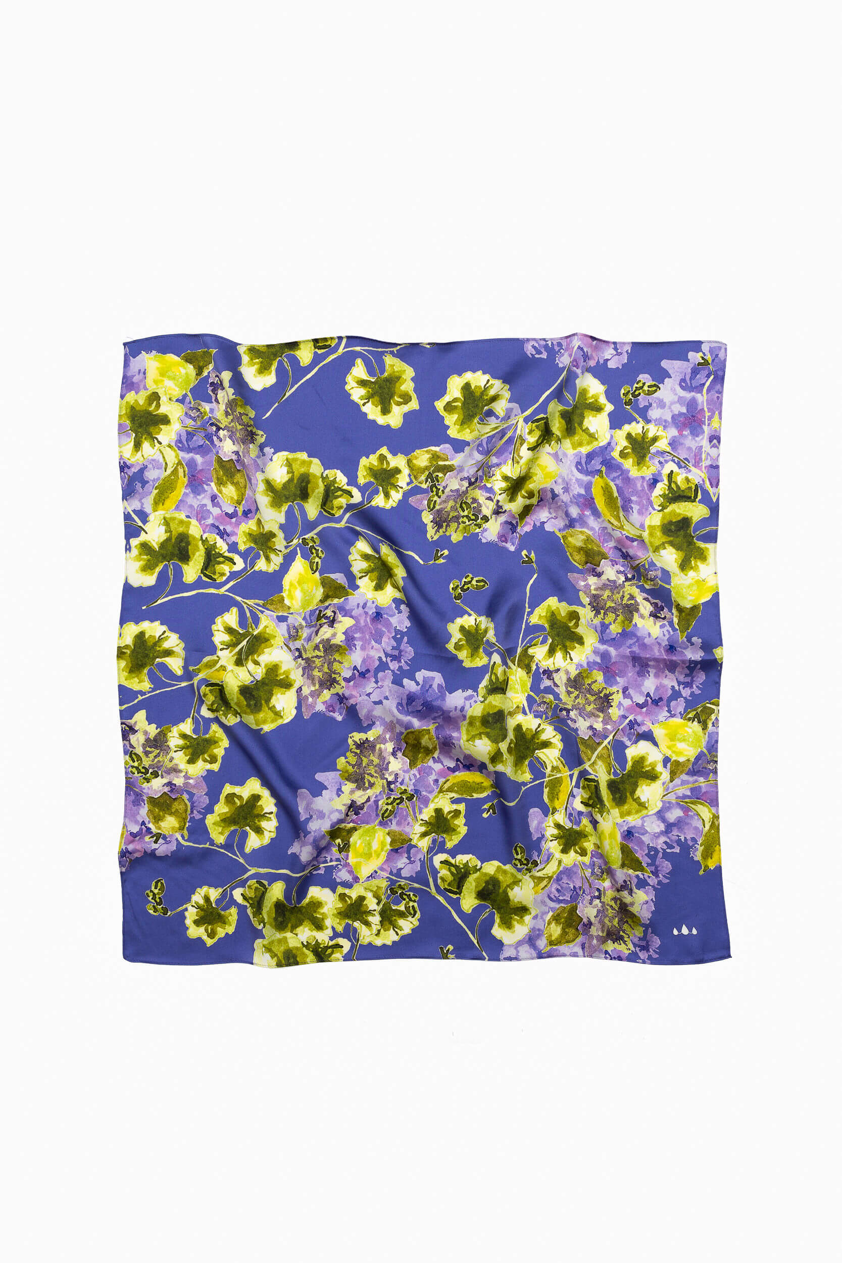 Floral patterned fabric with green leaves and purple flowers on a violet background