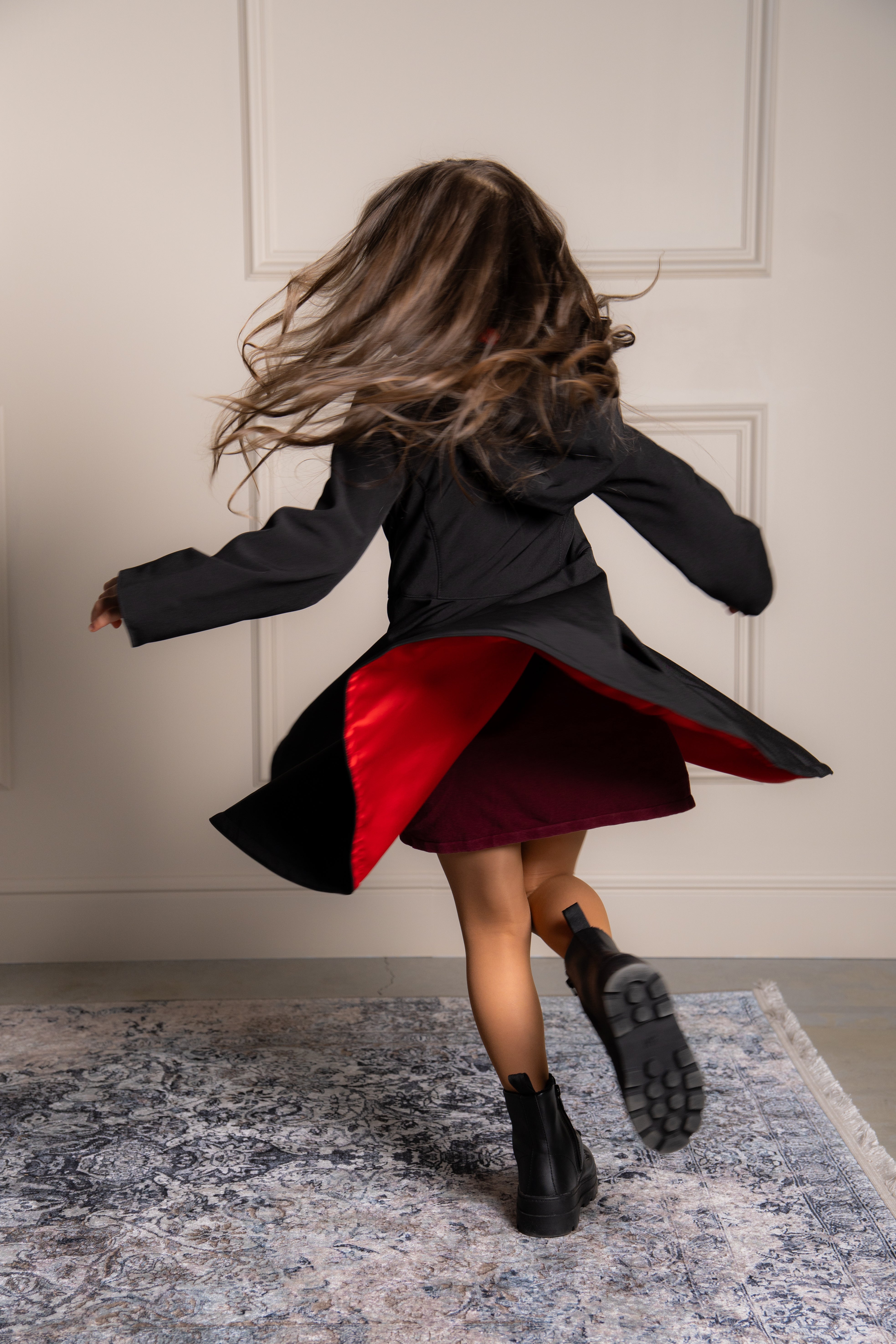 black girls coat in movement