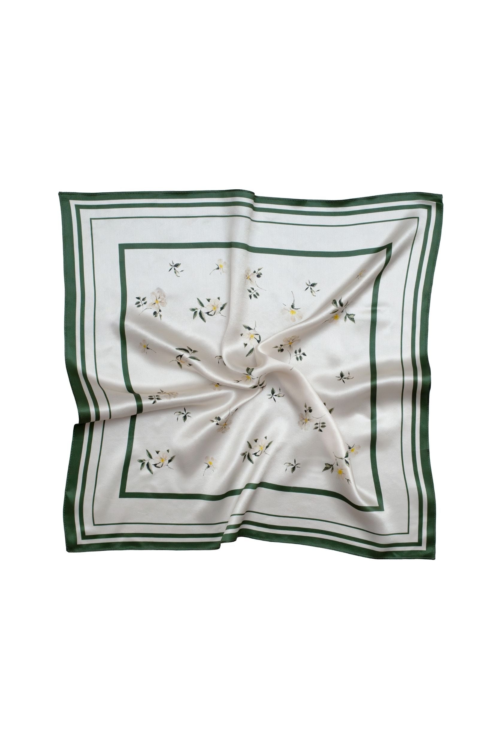 White square scarf with green border and floral patterns on a white background
