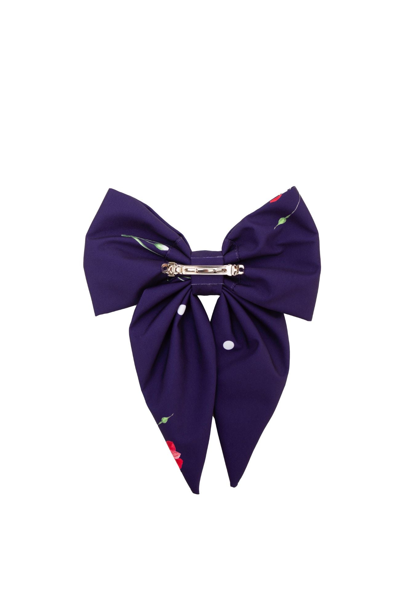 Purple bow with hair clip element on a white background
