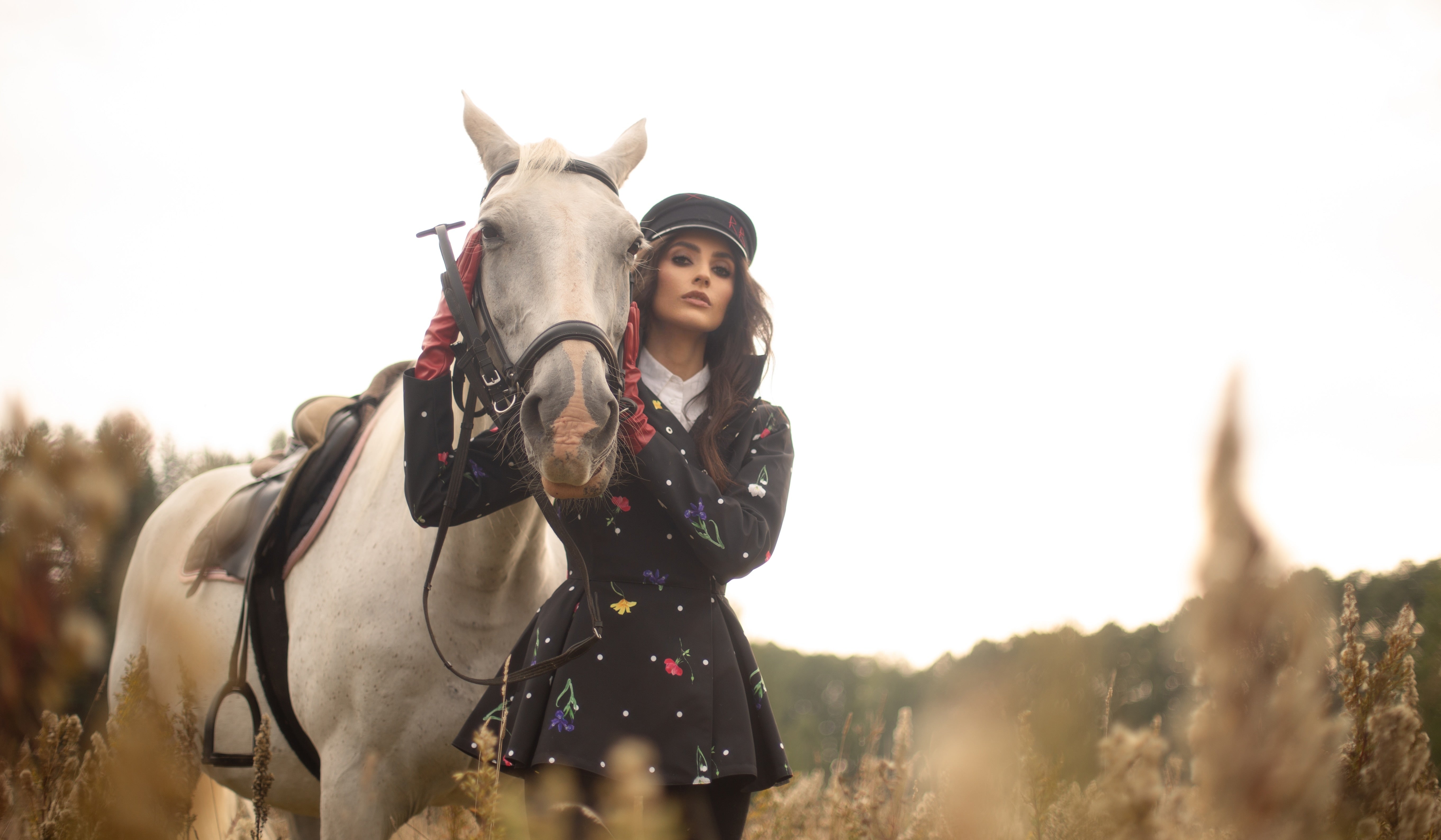 RainSisters-jacket-Cosmic-Meadow-waterproof-black-polka-dots-with-colorful-flowers-front