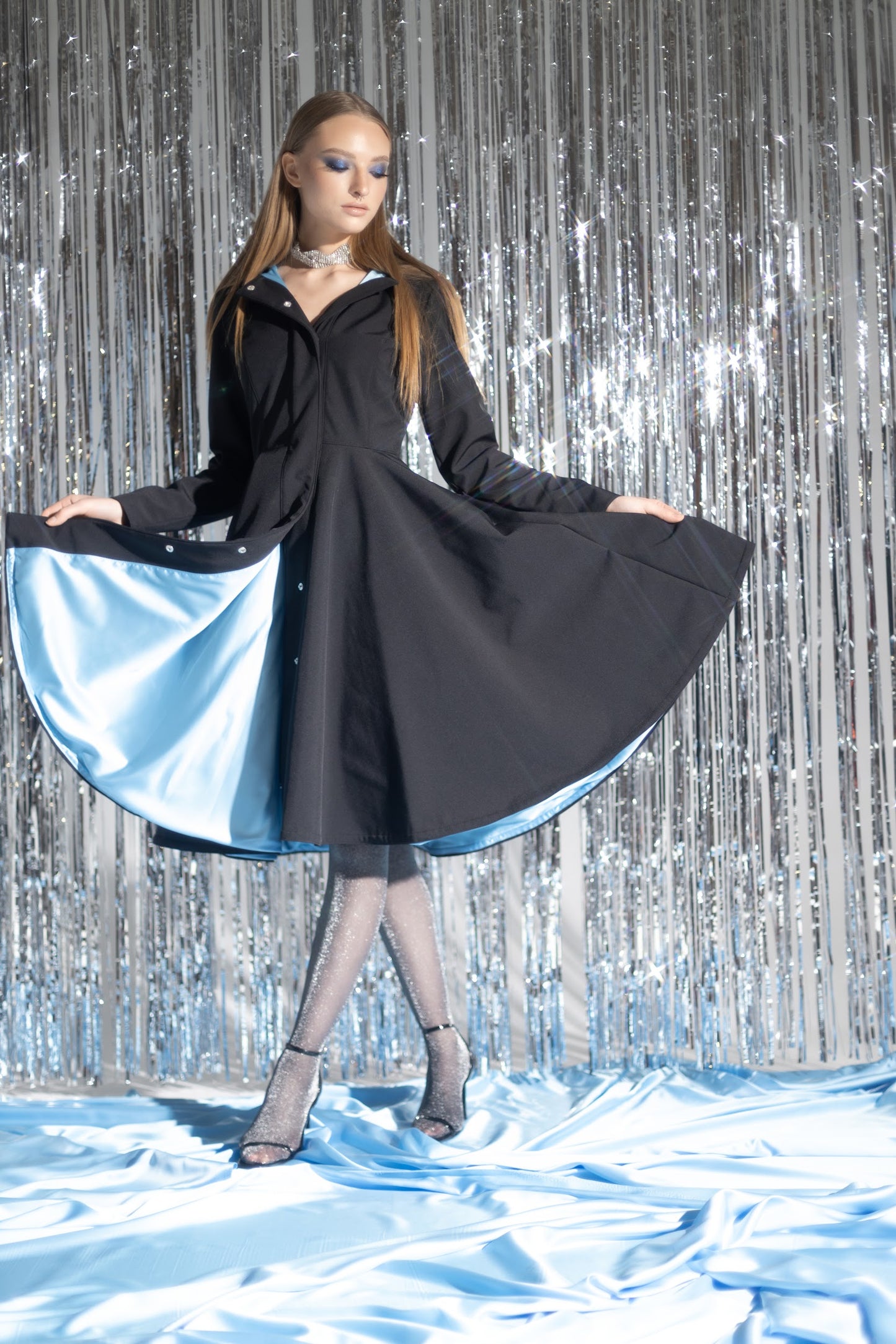 Solid Black Coat with full circle skirt part and Sapphire Blue Lining 