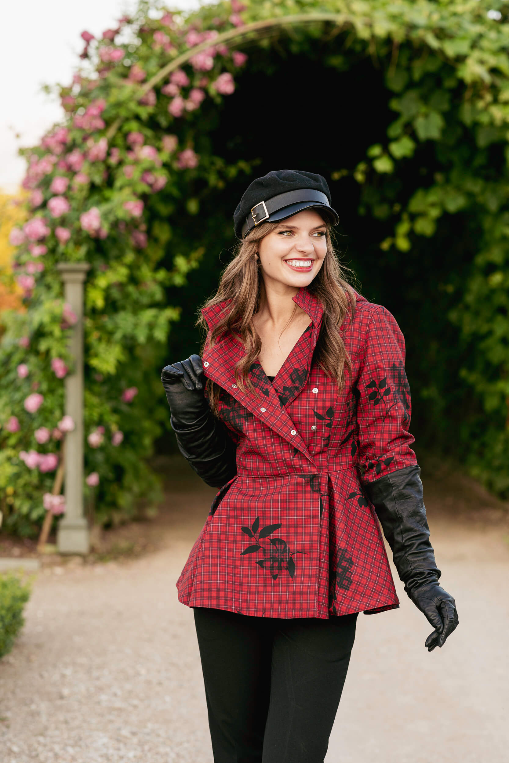 Model outdoors in the Crimson Heart jacket, perfect for rainy days.