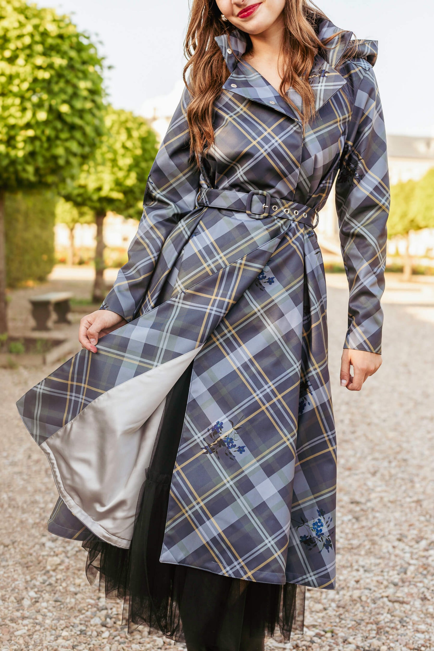 Close-up of belted waist and structured design of Duchess in Blue coat.