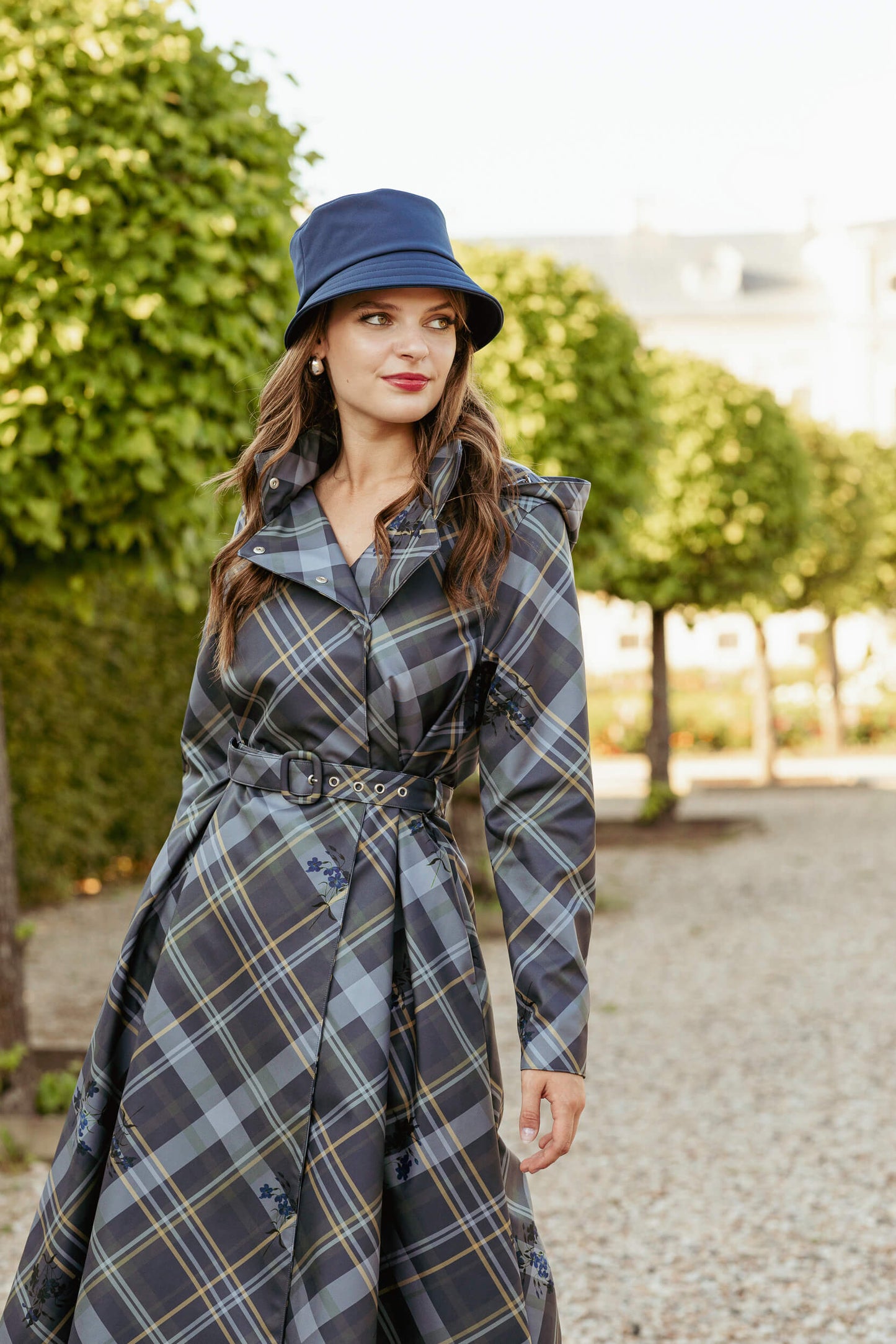 Duchess in Blue coat paired with a soft hat for a refined autumn outfit.
