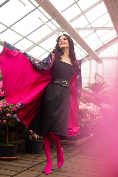 bright pink lining of the fitted trench coat