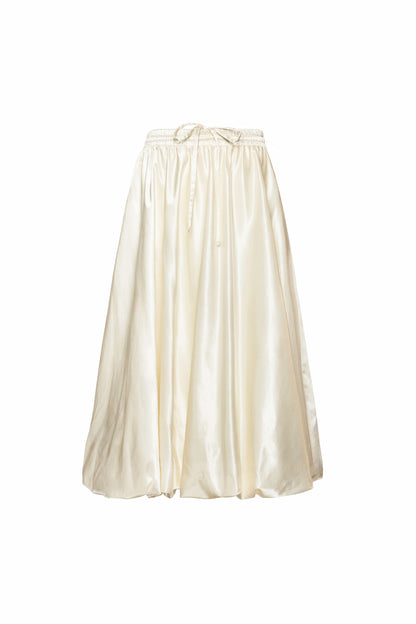 Off-white women’s midi skirt with balloon shape, hidden in-seam pockets, and adjustable waist, perfect for layering under dresses or pairing with coats.