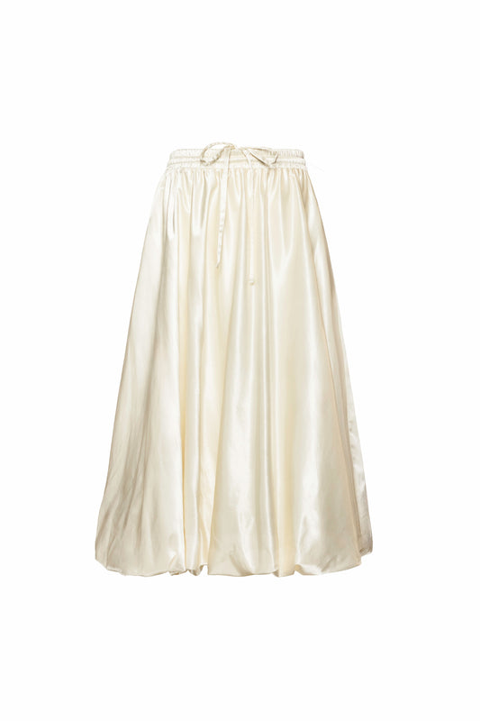 Off-white women’s midi skirt with balloon shape, hidden in-seam pockets, and adjustable waist, perfect for layering under dresses or pairing with coats.