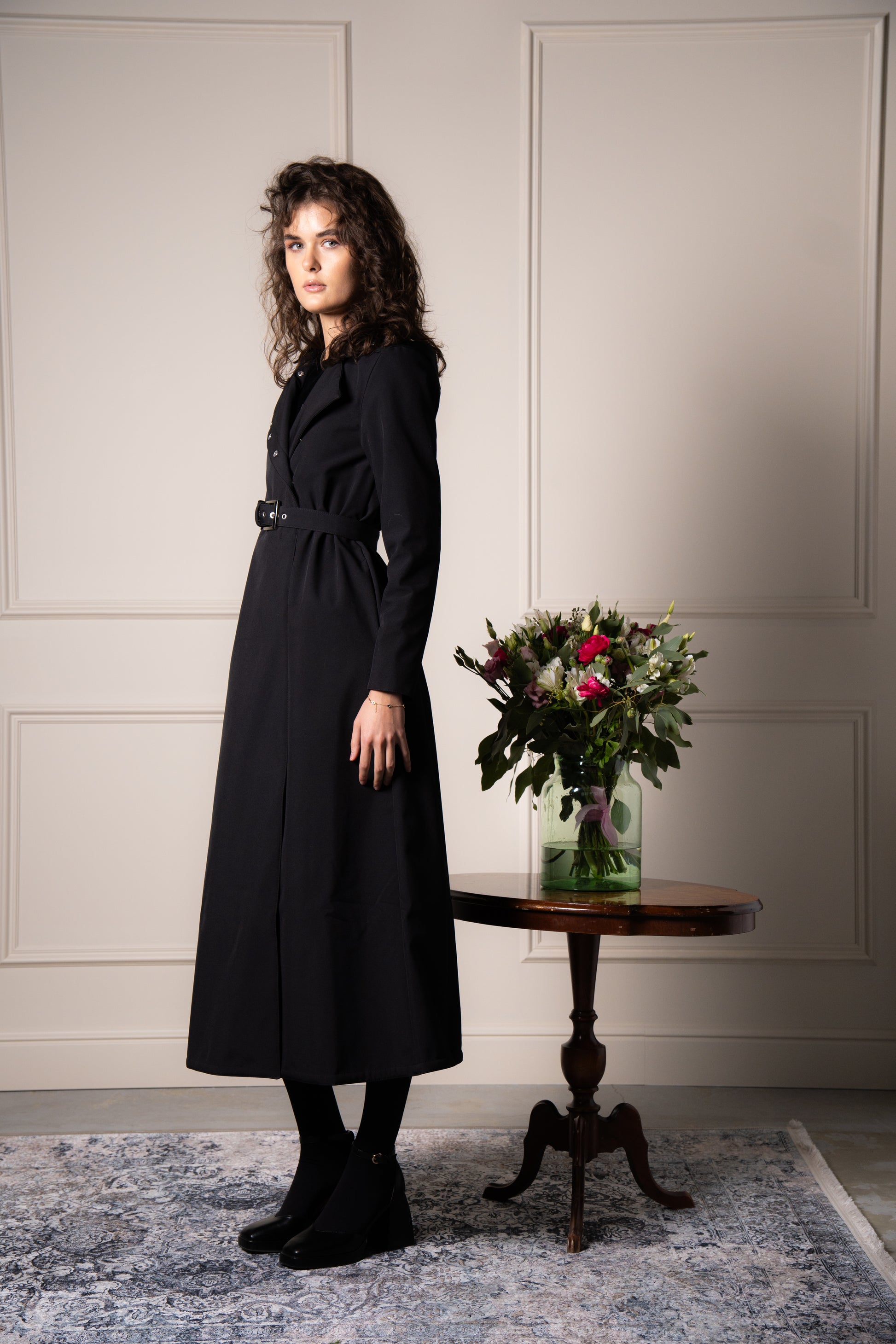 solid black coat in A-line cut