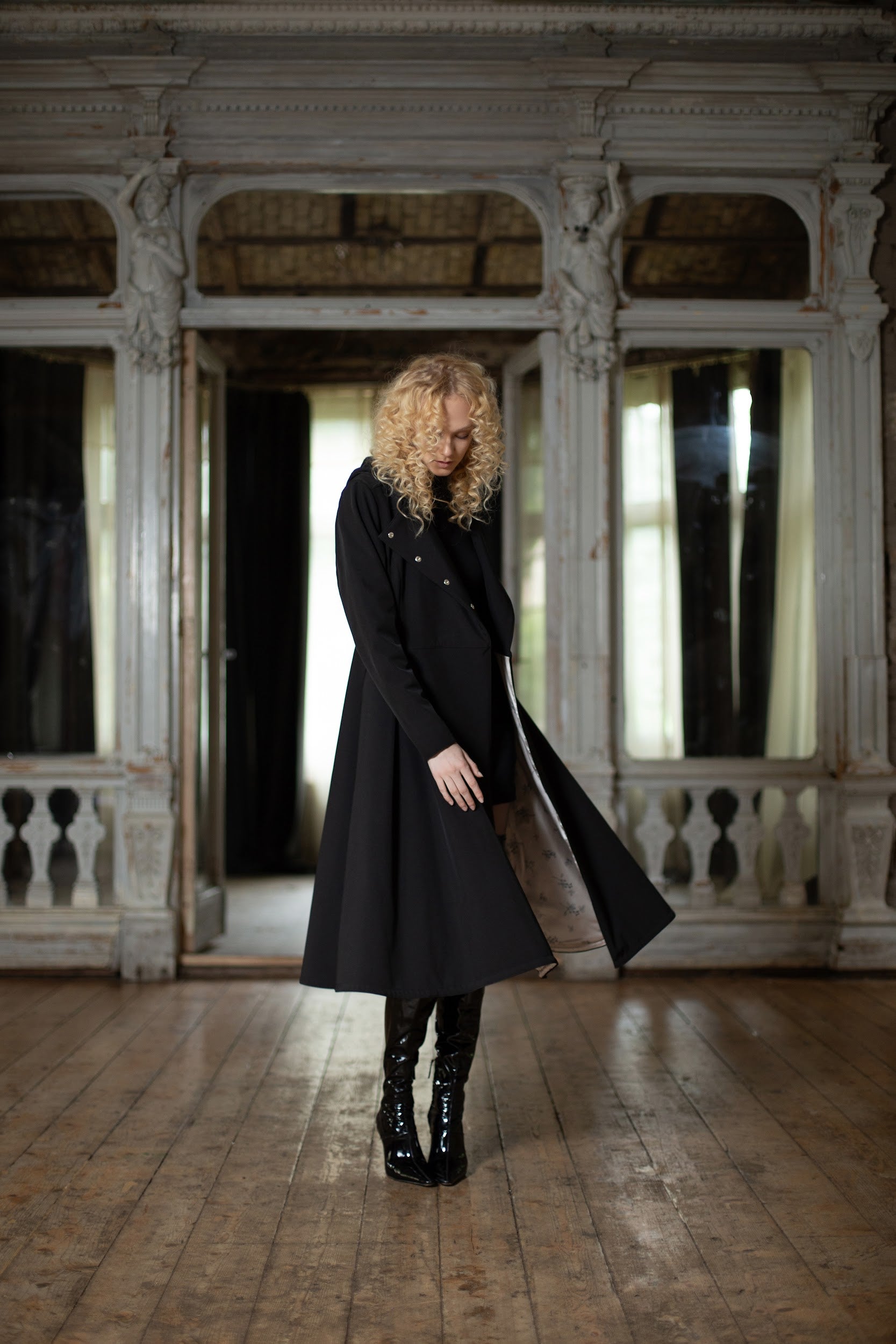 Waterproof coat in black with full body lining