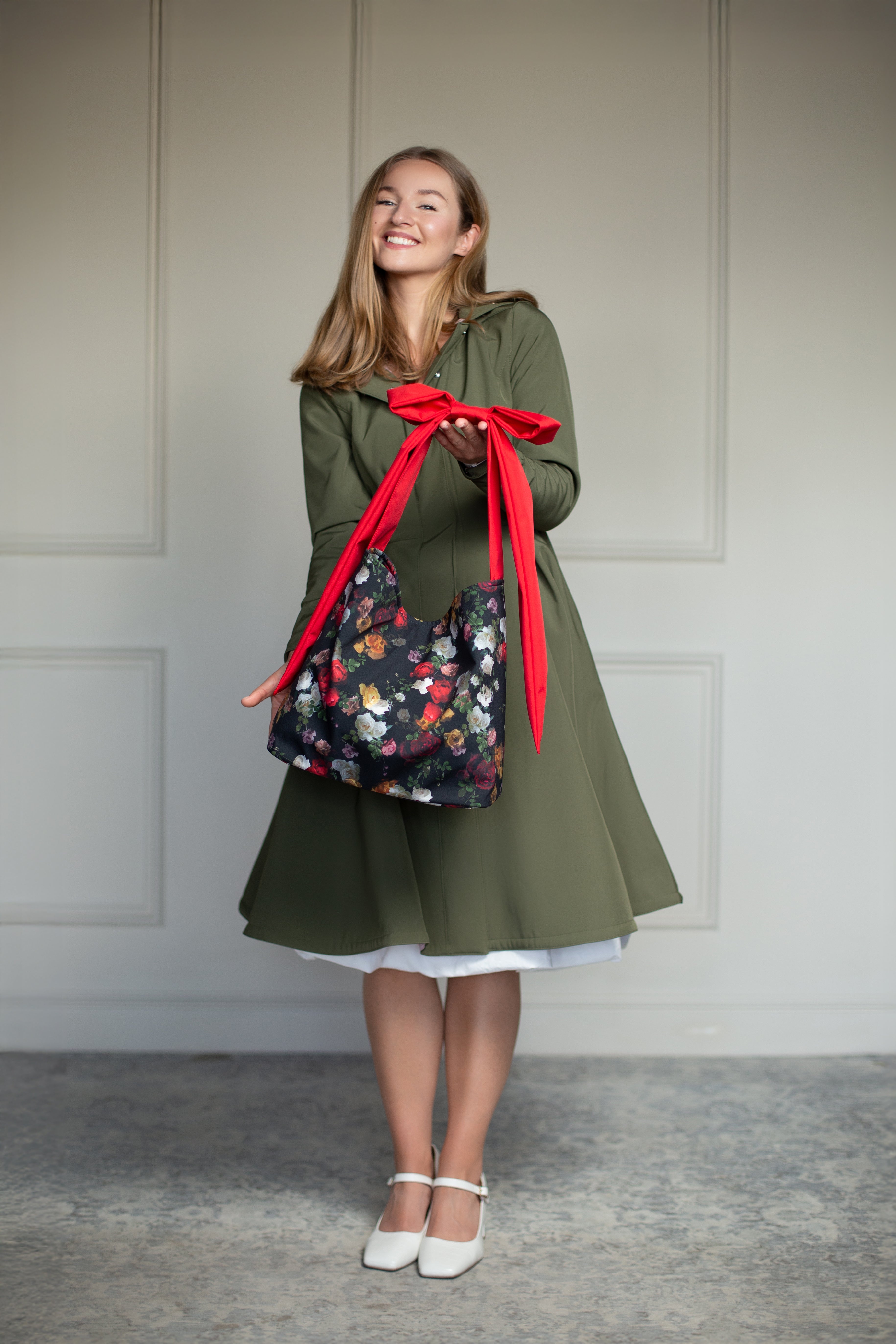 Elegant floral tote bag with red bow accent, showcasing the full front design of the Darling Rose Tote.