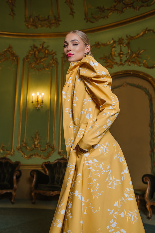 yellow trench coat with white flower print