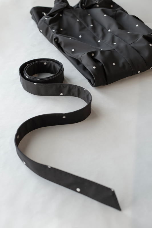 black tie belt with white polka dots