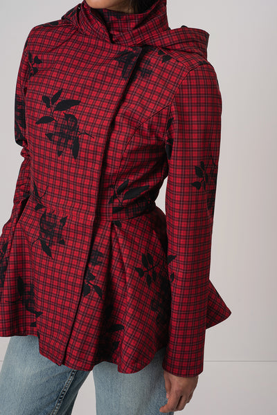 RainSisters red and black plaid hooded jacket Crimson Heart with black floral print, worn by a model with blue jeans against a plain light gray background.