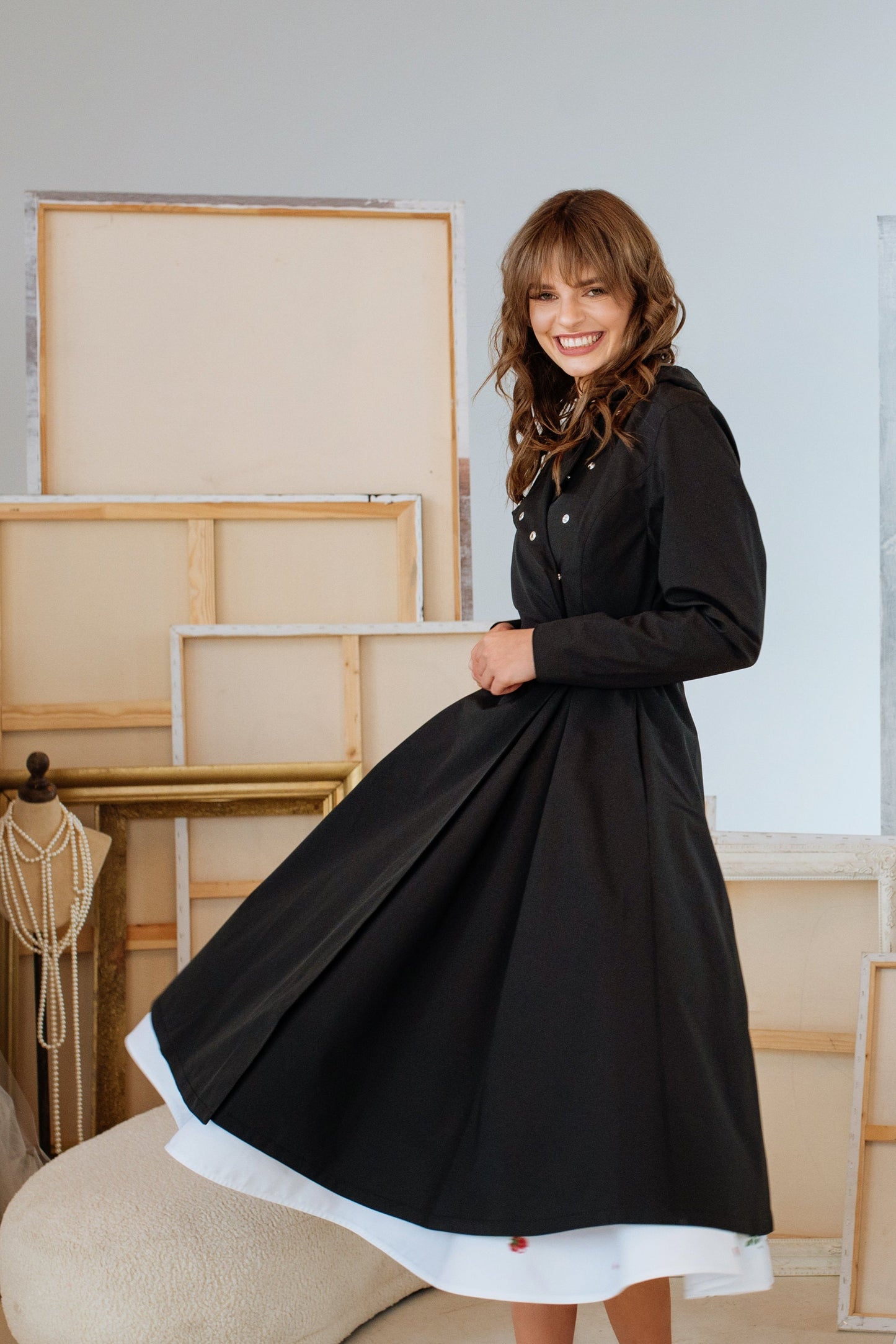 Black beautiful coat, that is waterproof and light-weight.  