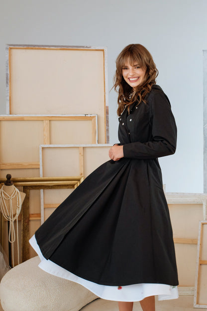 Black beautiful coat, that is waterproof and light-weight.  