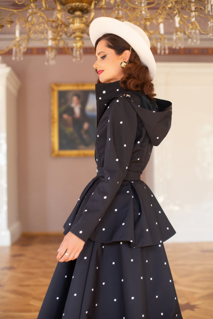 black coat with polka dots print and a hood