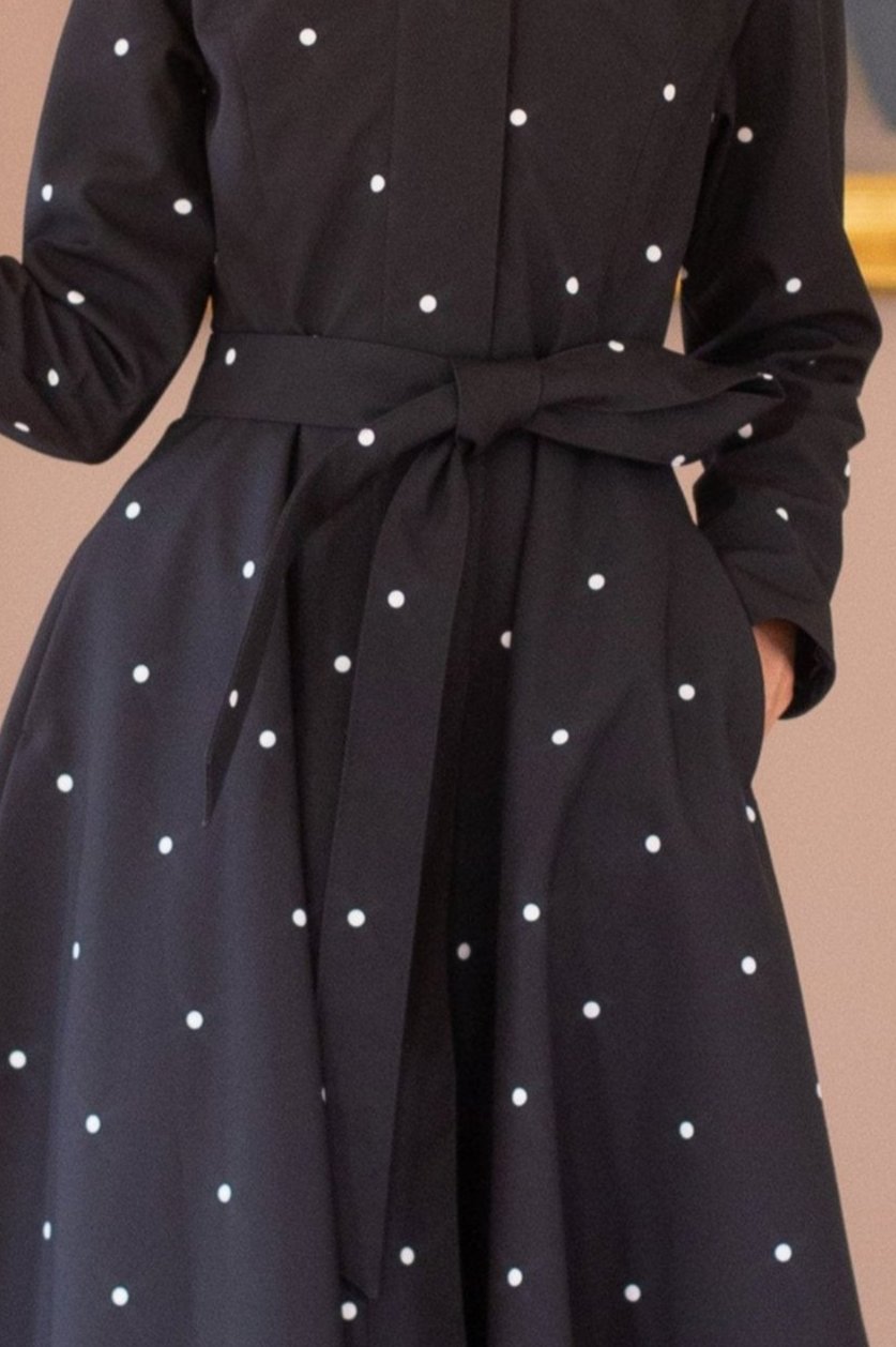 black coat with white polka dots print and the same style tie belt